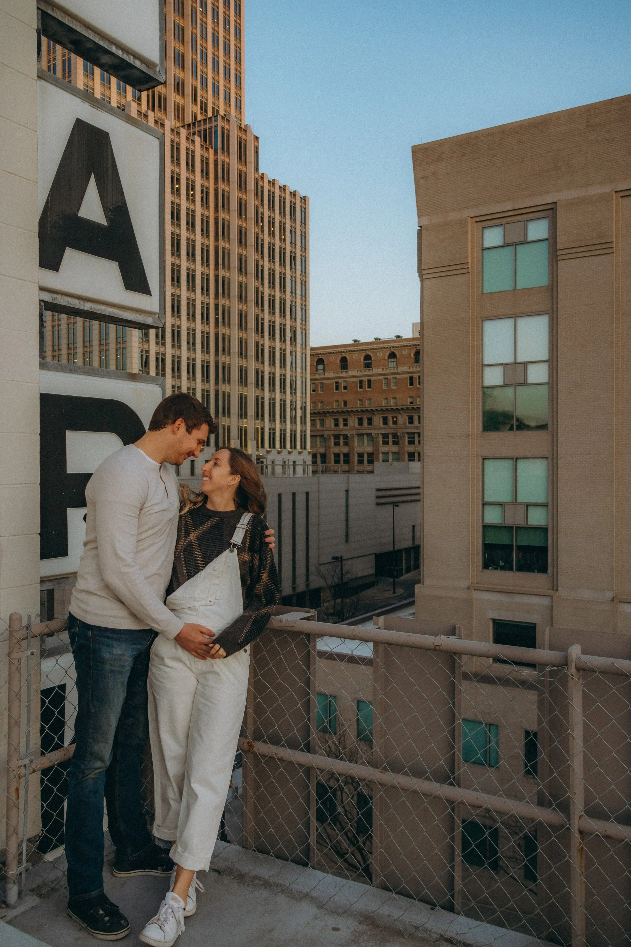 Grace + Josh Maternity Photos in Downtown Omaha