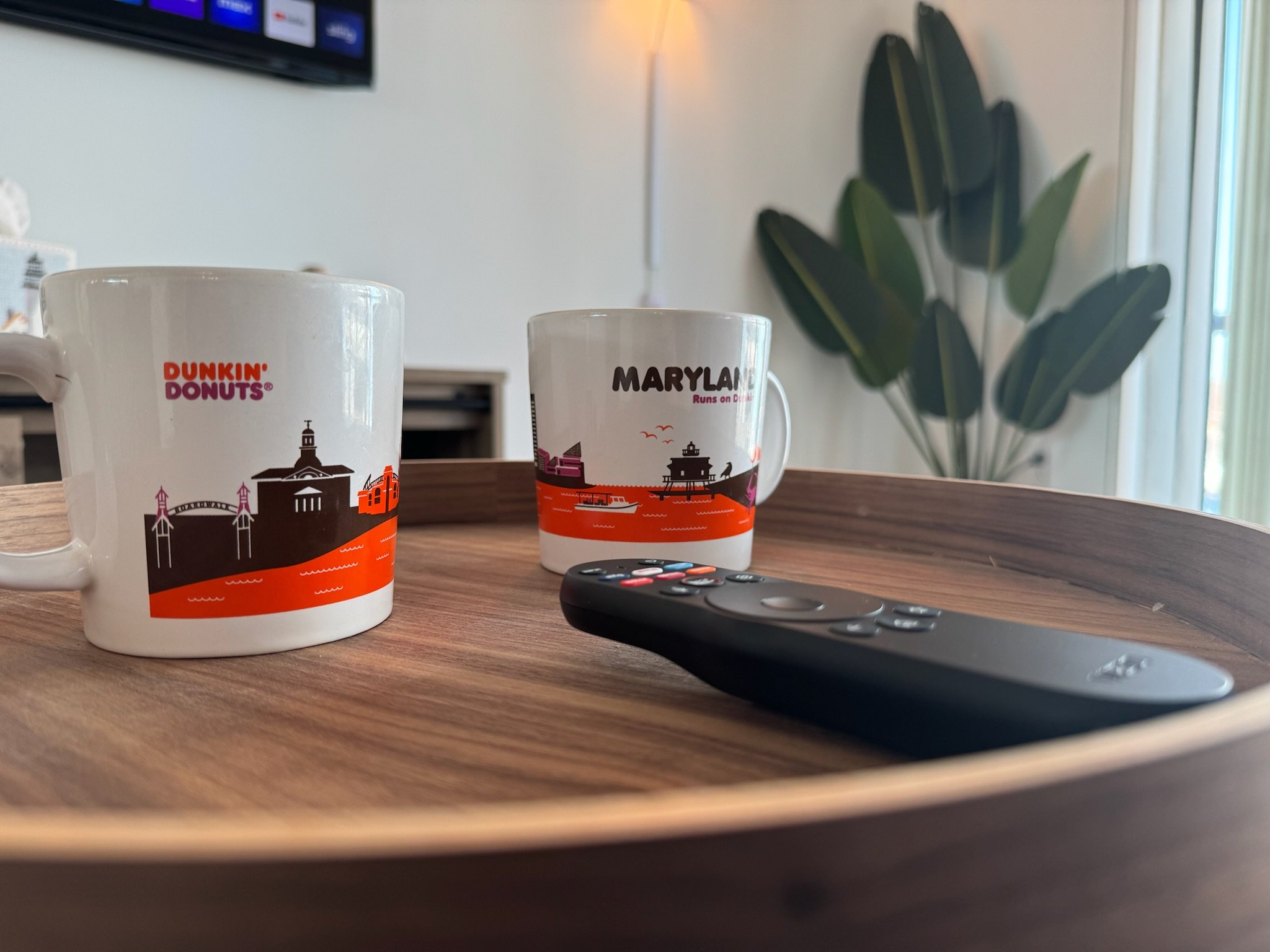 Vintage Maryland Dunkin Donuts mugs on a tv tray
