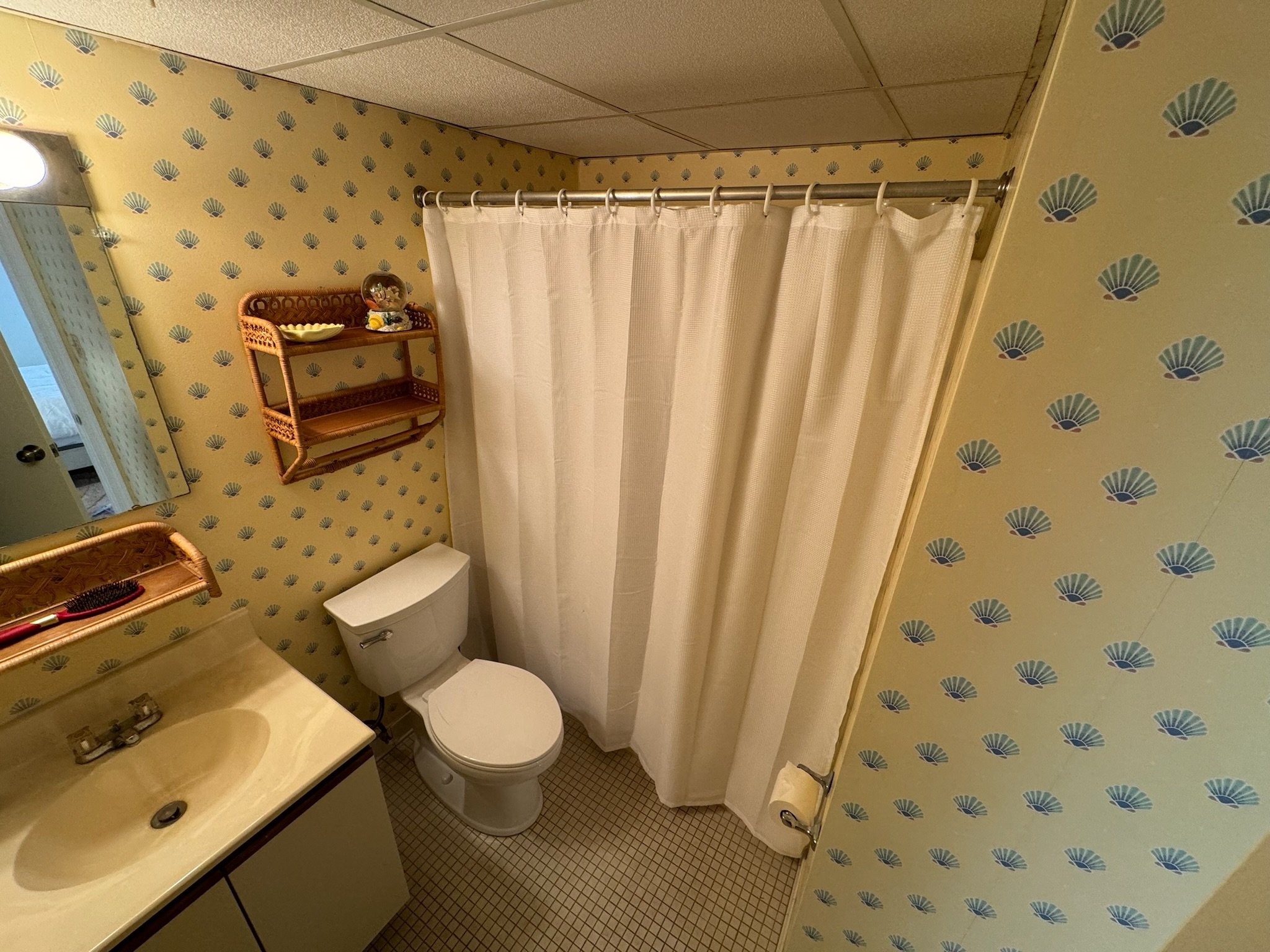Primary bathroom of Visit The Beach condo