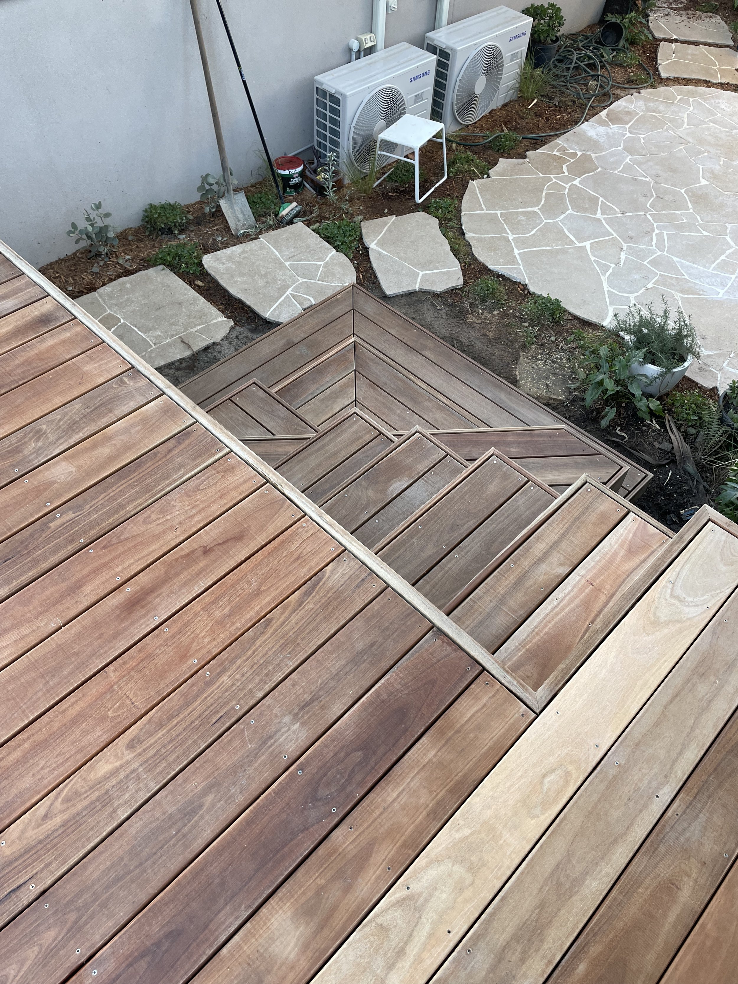 Birds Eye view deck meeting stairs before oiling
