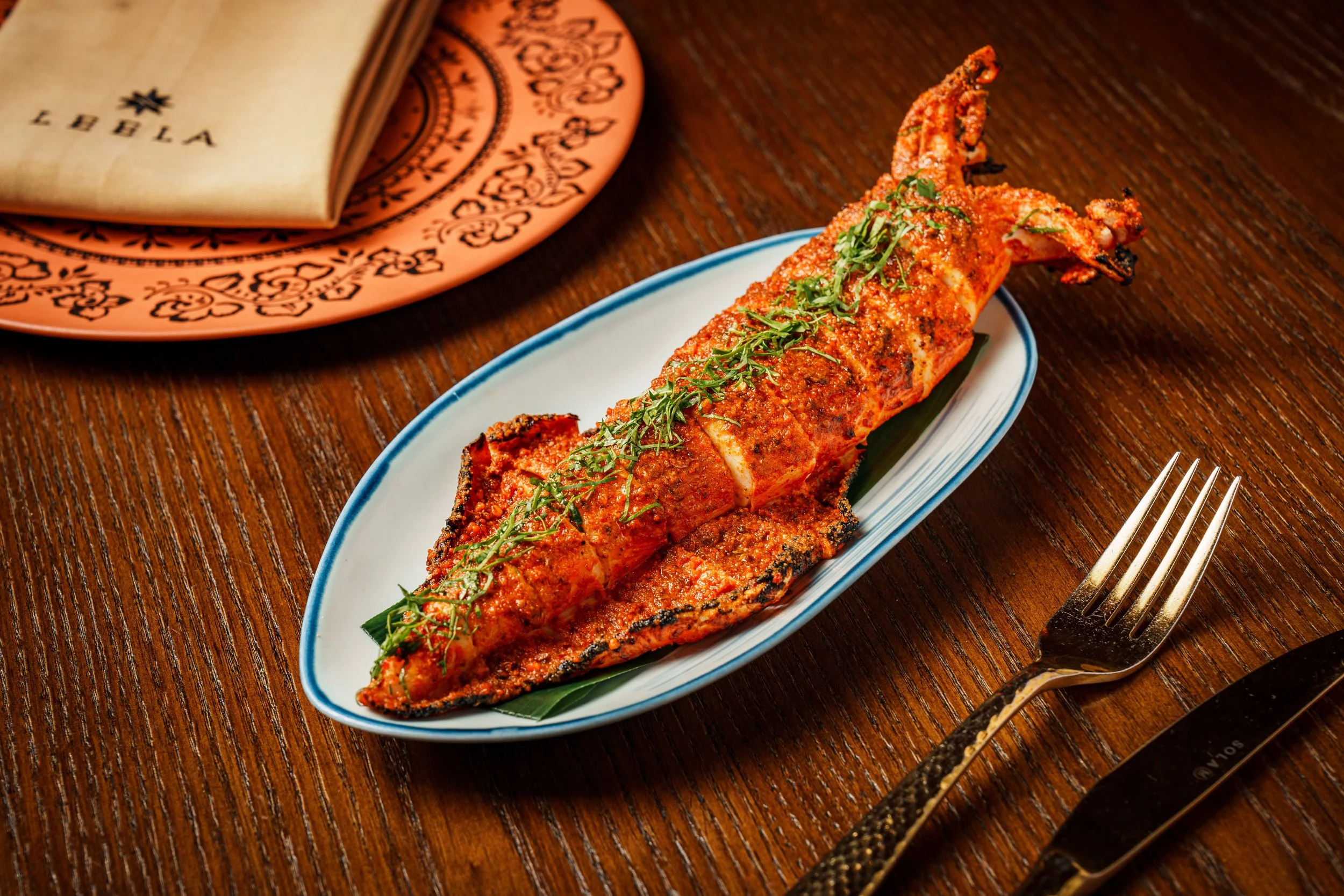 Locally sourced U3 squid from Sai Kung, marinated with shenga chutney, offering a coastal freshness balanced by bold Indian spice.