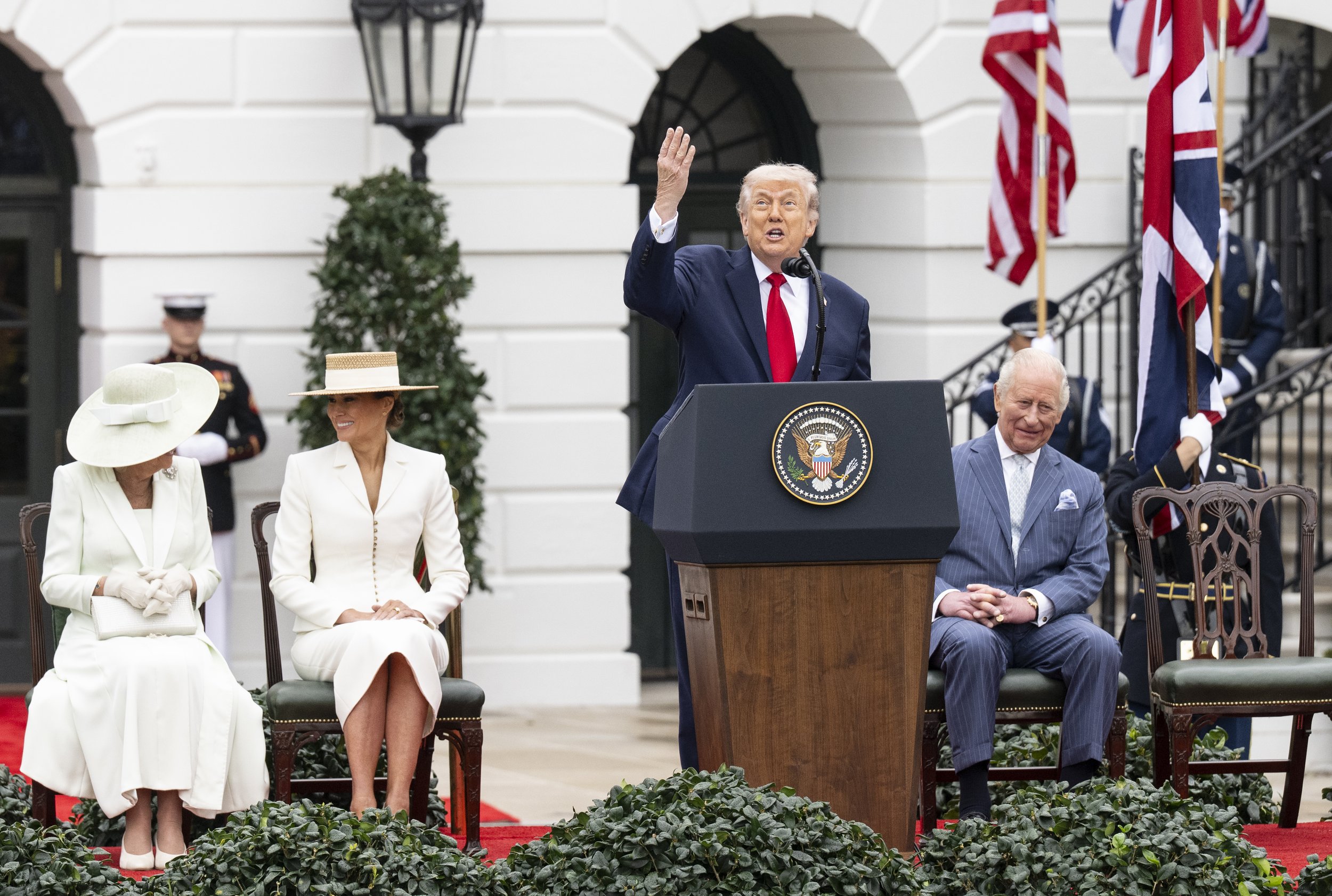 President Donald Trump jokes about the bad weather Britain's King Charles III and Queen Camilla brought over from Britain April 28, 2026, during a the state welcome ceremony on the South Lawn of the White House in Washington D.C. King Charles III and