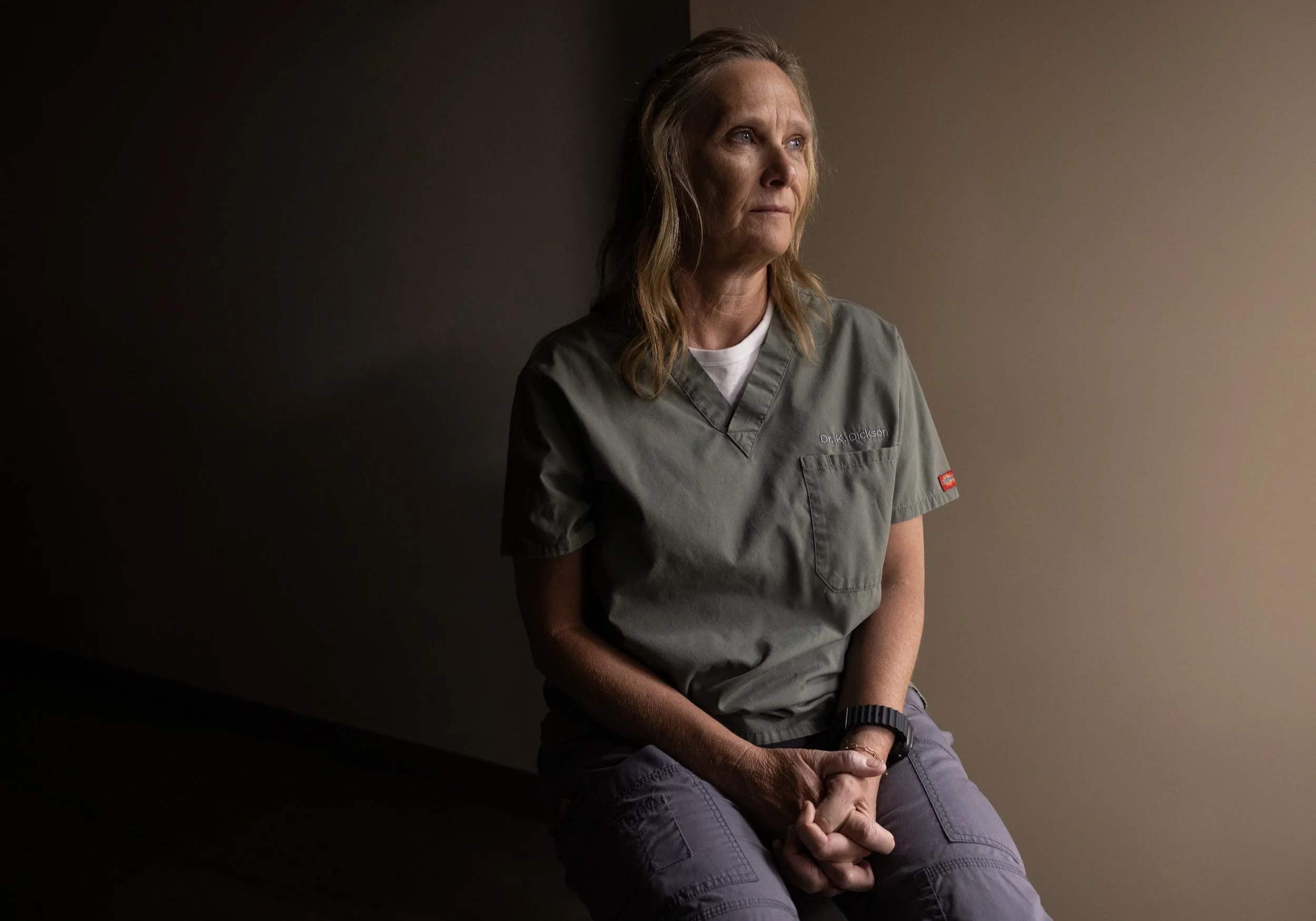 Doctor of Osteopathic Medicine Kimberly Dickson sits inside South Bay Urgent Care July 8, 2025, before it opens for the day in Imperial Beach, Calif. Dickson and her husband Matthew Dickson, also a Doctor of Osteopathic Medicine, own and operate Sout