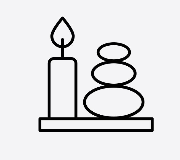 Line drawing of a candle and stacked stones on a tray or shelf.