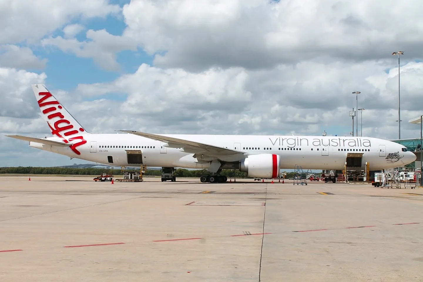 ✈️ A sight unfortunately no longer seen. Virgin Australia 777-300 at the Brisbane International Airport terminal.

This aircraft VH-VPH was ordered new for the airline operating flights from Australia's East Coast to Los Angeles. This aircraft is now
