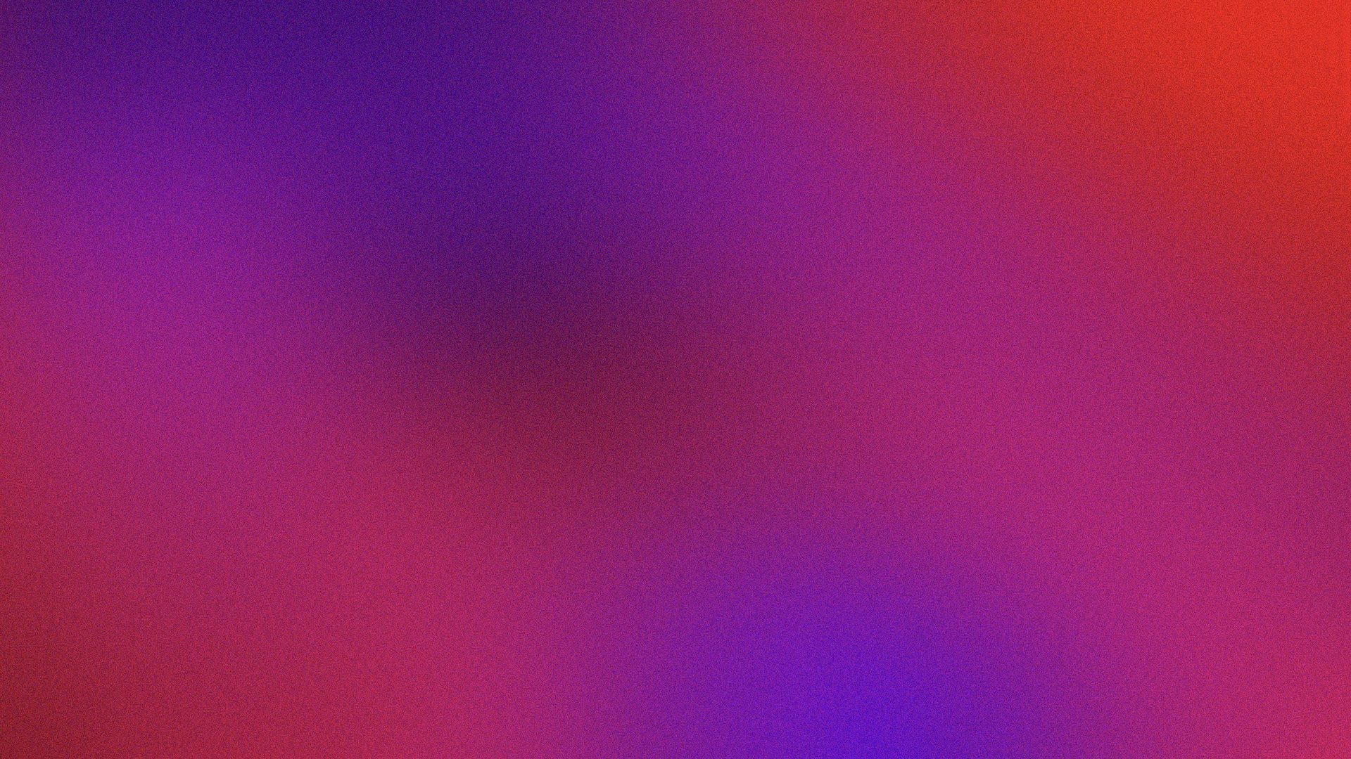 An abstract gradient background with shades of purple, pink, and red blending into each other.