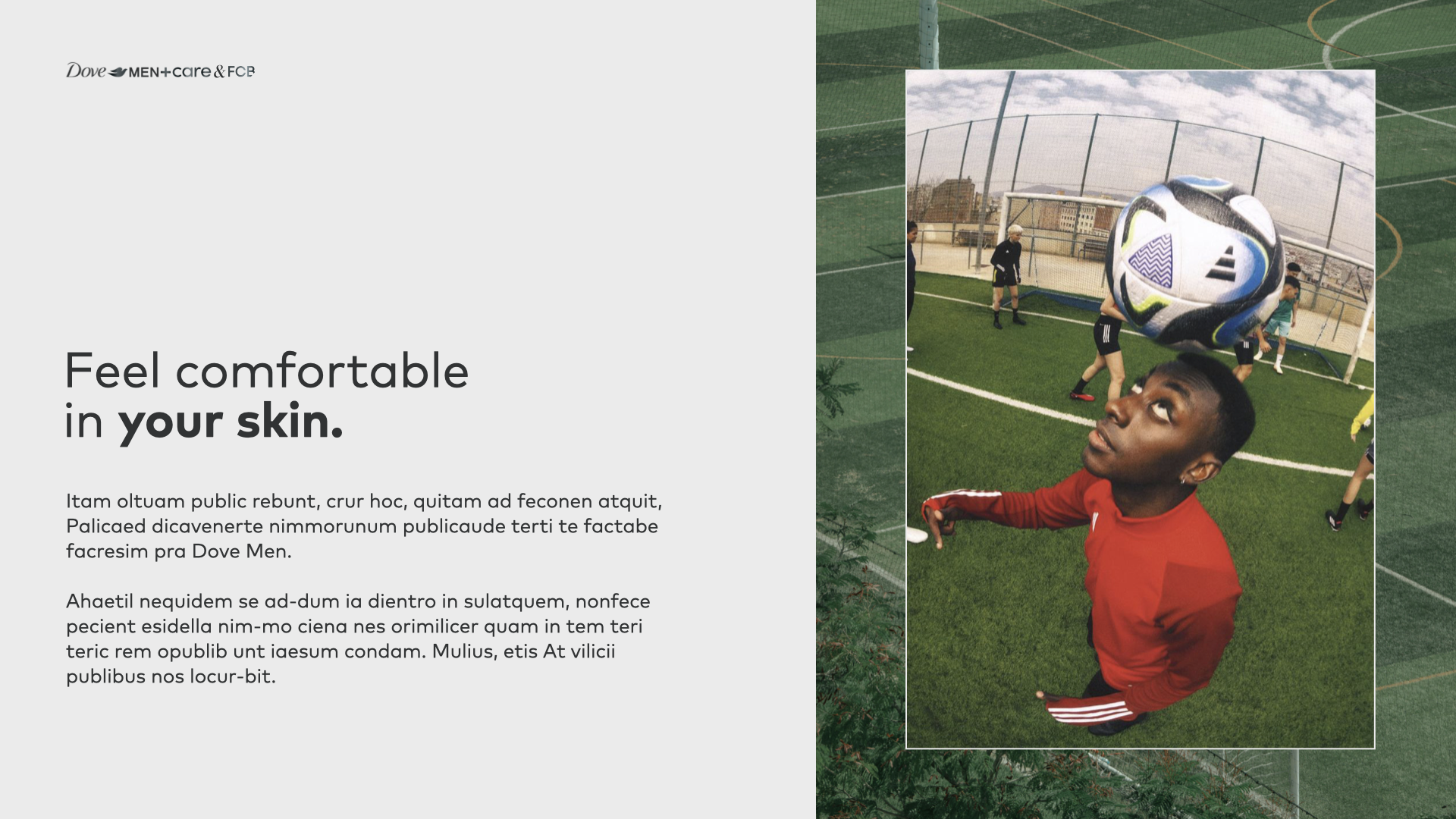 Young man on a soccer field looking up while an soccer ball is about to hit his forehead, with other players and goalposts in the background.