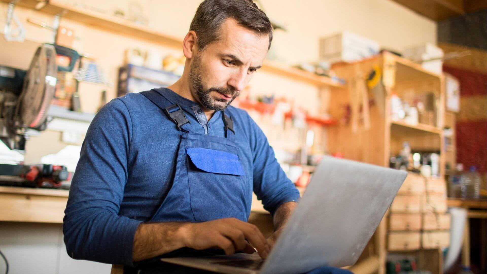 business-owner-checking-business-credit-score-on-laptop