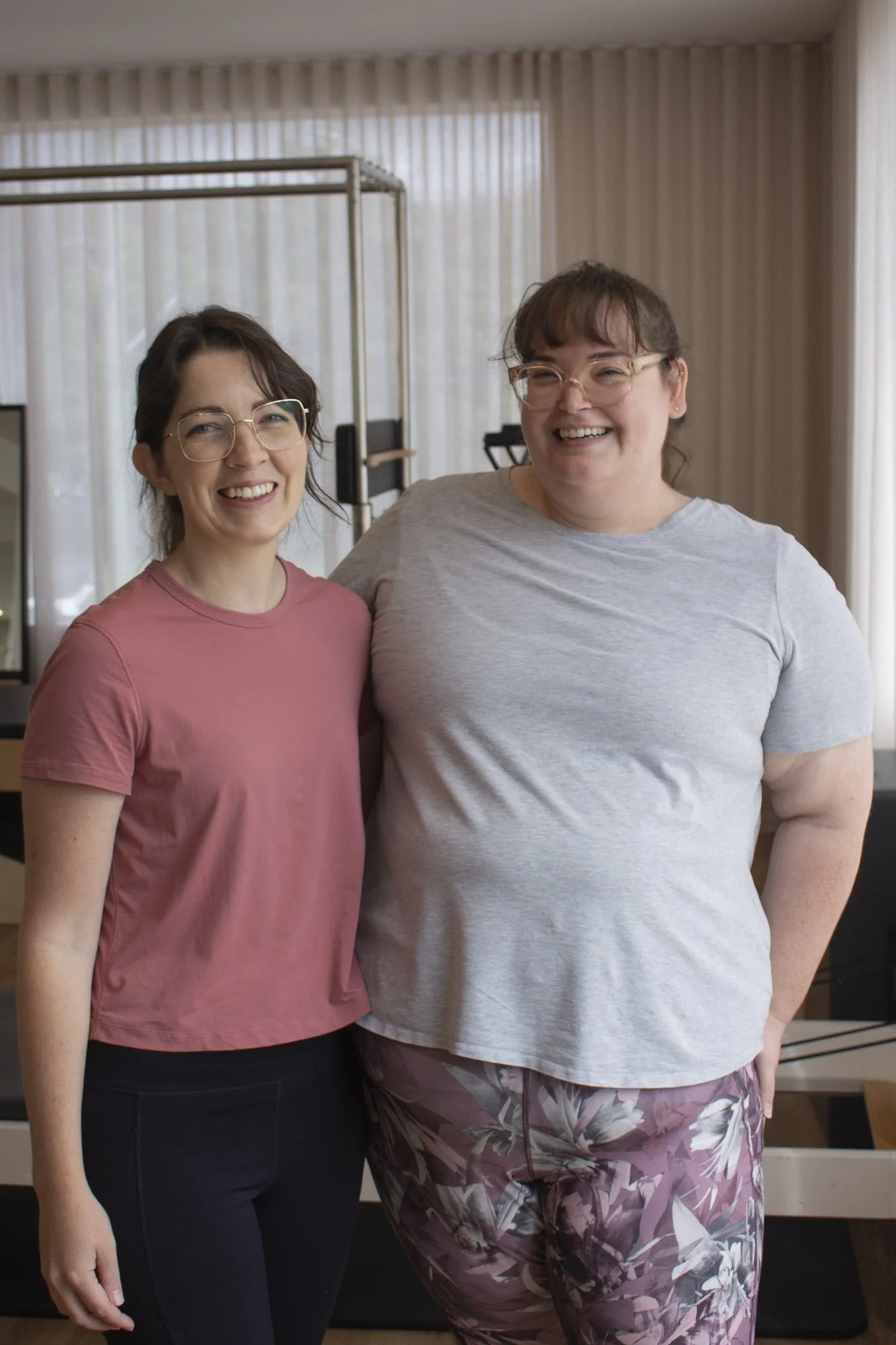 Smiling any.BODY members after class, inclusive community vibe