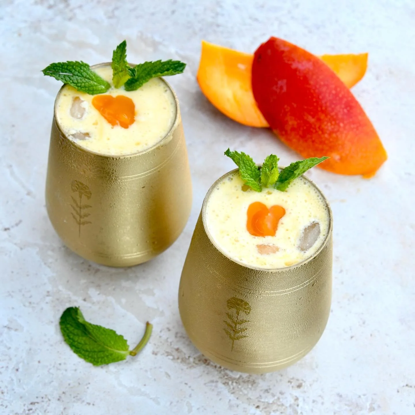 Delicious mango lassi to beat the summer heat! Find the recipe and story about our travels in Jodhpur, Rajasthan in the link in bio