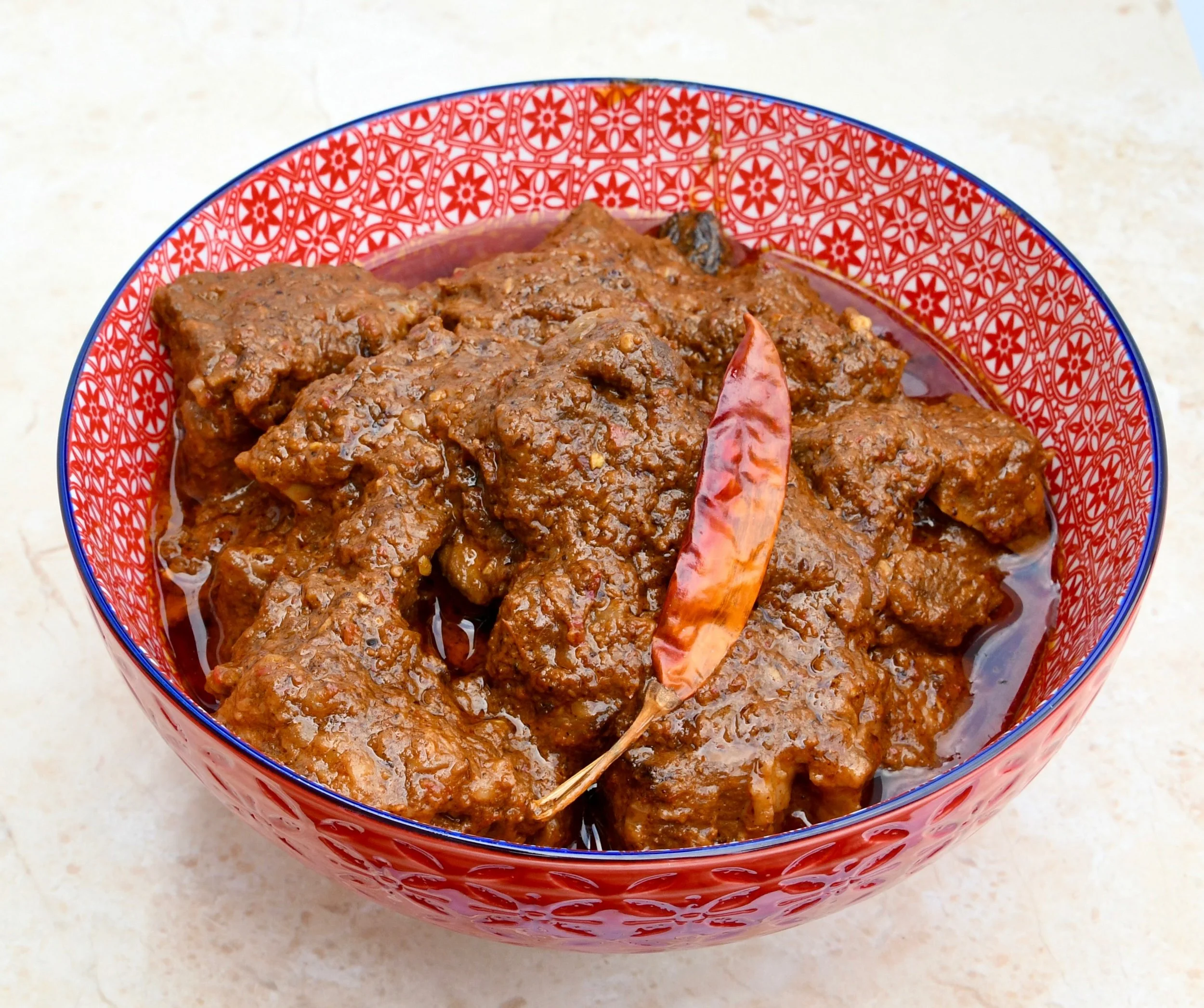 Fiery, phenomenal Laal Maas lamb curry from Jaipur, Rajasthan! Find the recipe, story and photos on the blog, link in bio