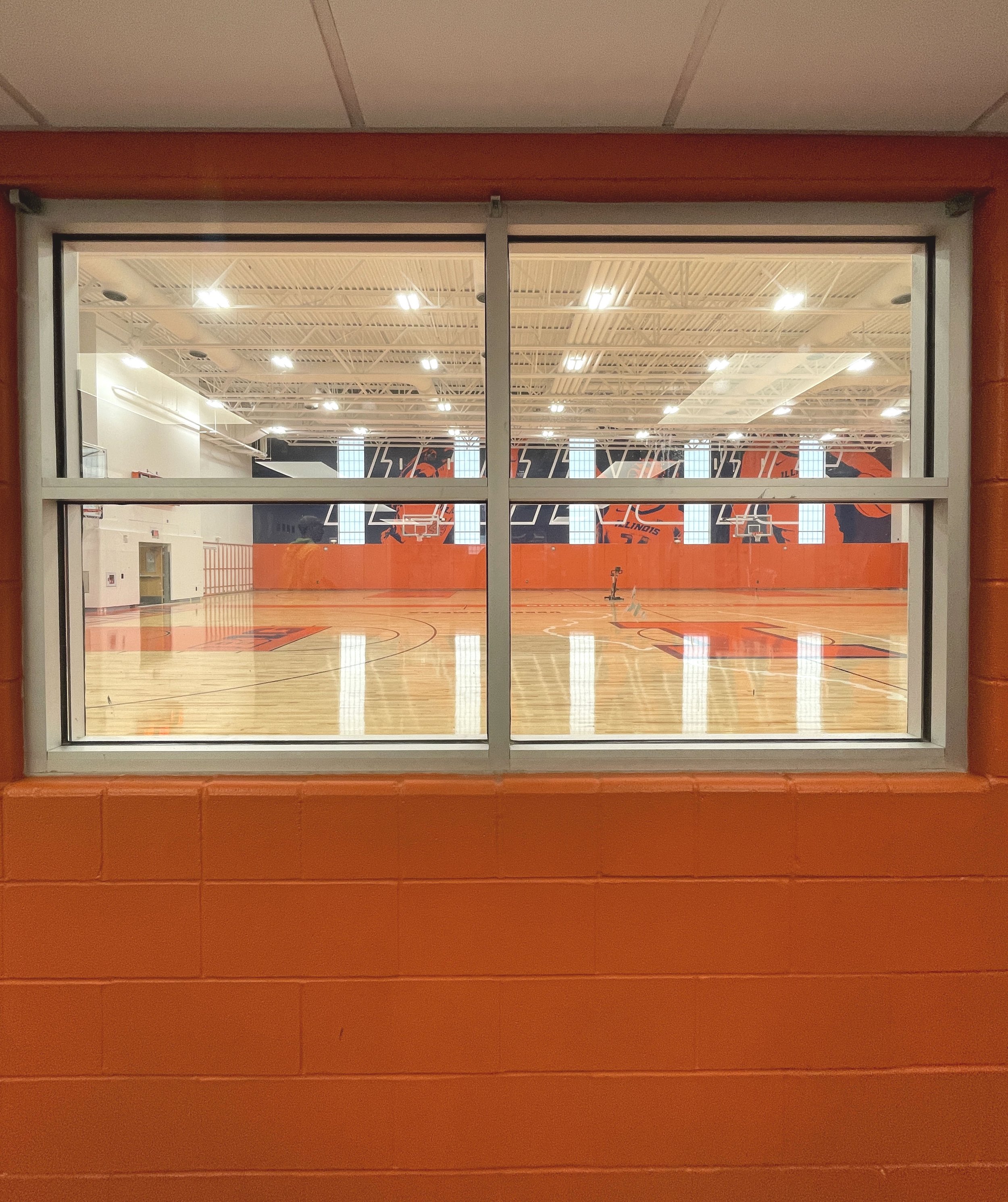 UIUC Ubben Interior Window to Basketball Court.jpg