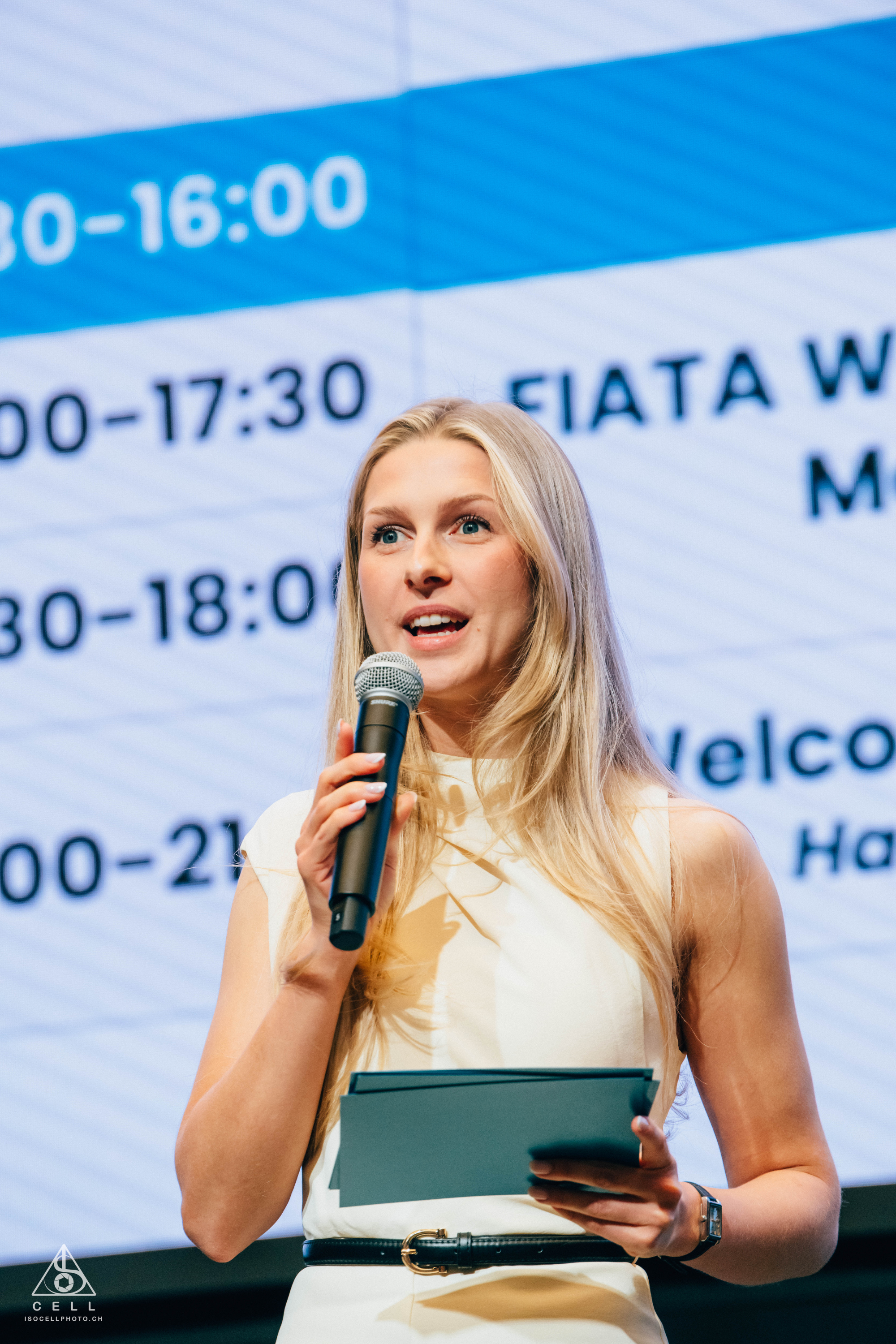 Professional Moderator on stage for a logistics business conference in Switzerland