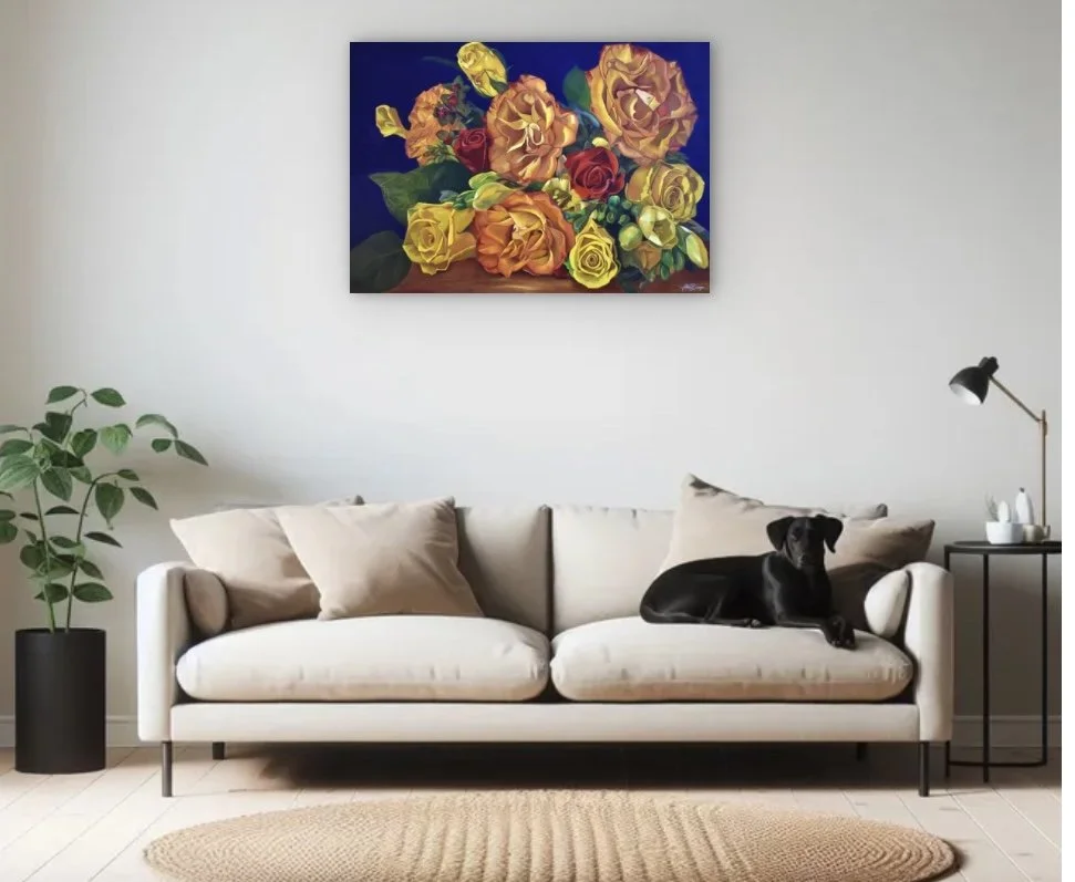 Living room with a beige sofa, black dog, houseplant in a black pot, and a colorful floral painting on the wall.