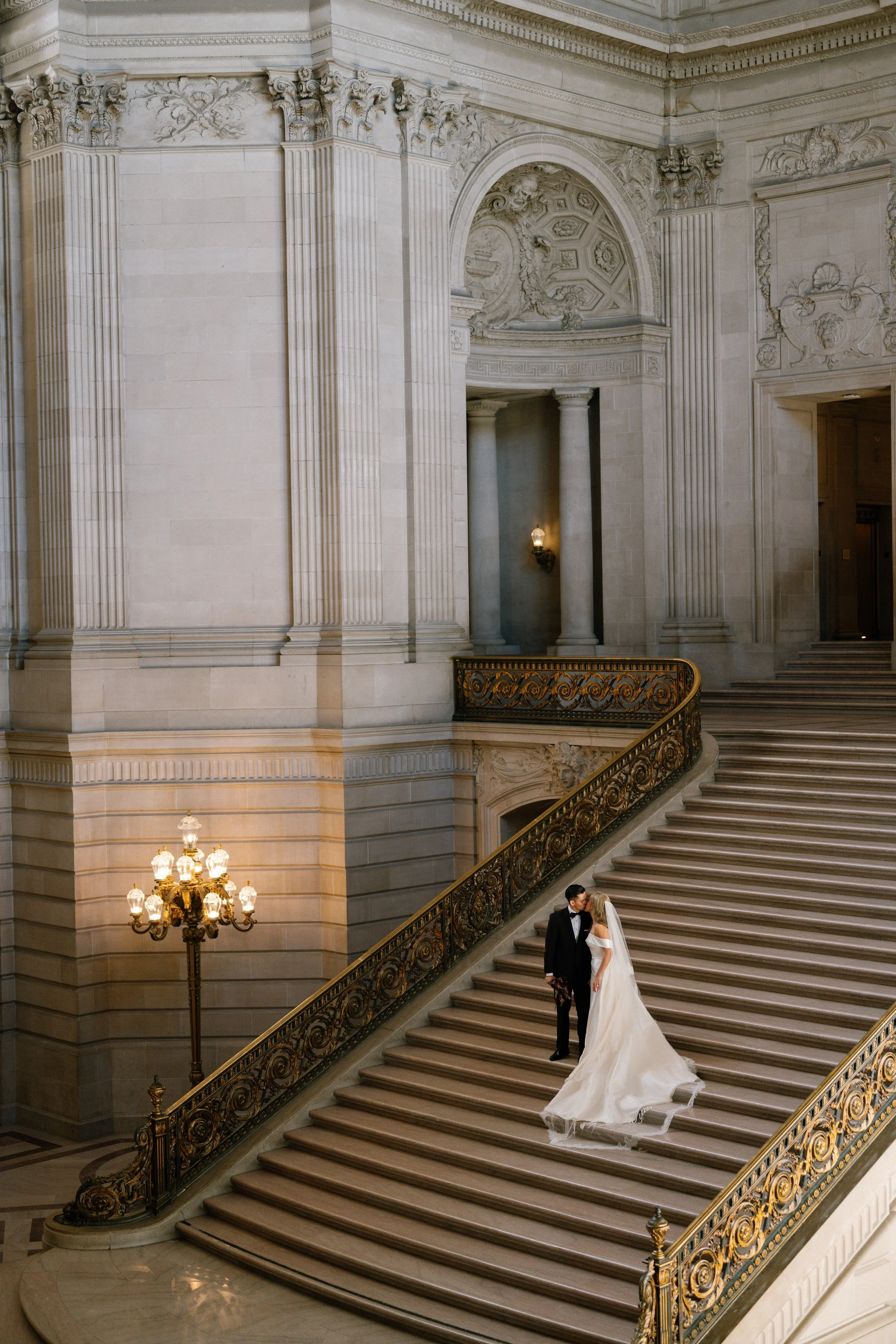 Luxury wedding couple ceremony photographed at San Francisco Courthouse by Heirloom Foto
