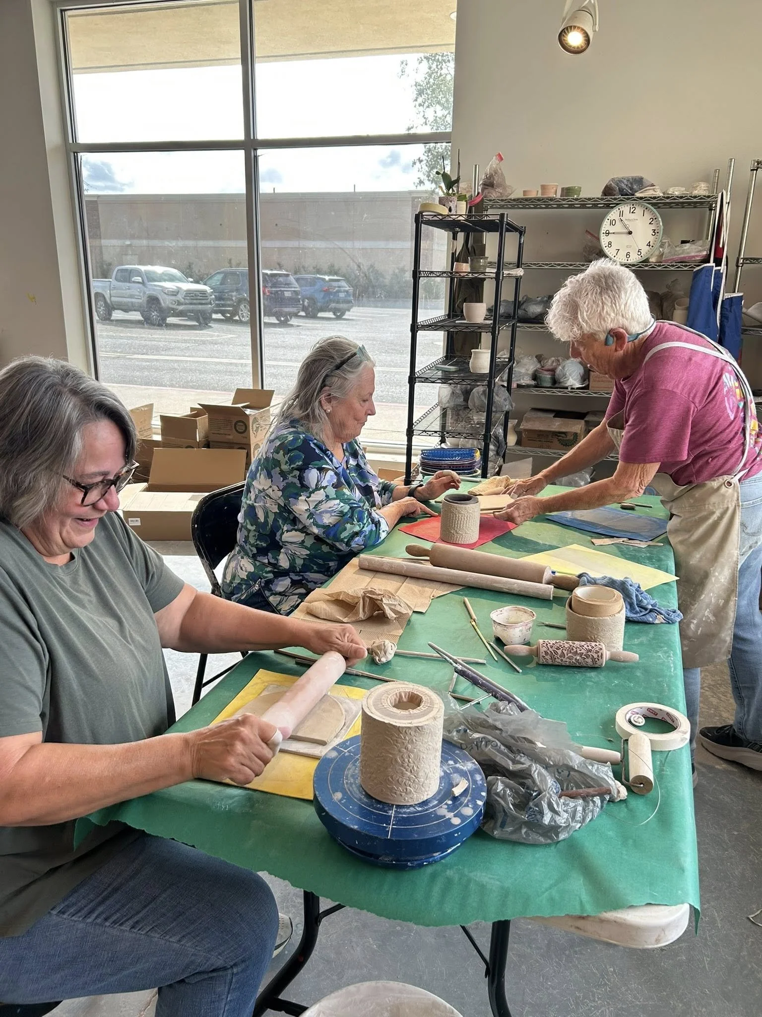 people doing pottery