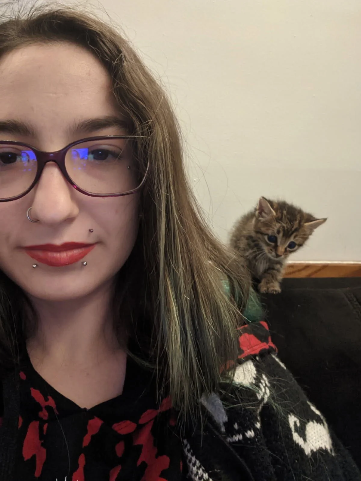 Erica and Kitten behind her.jpeg