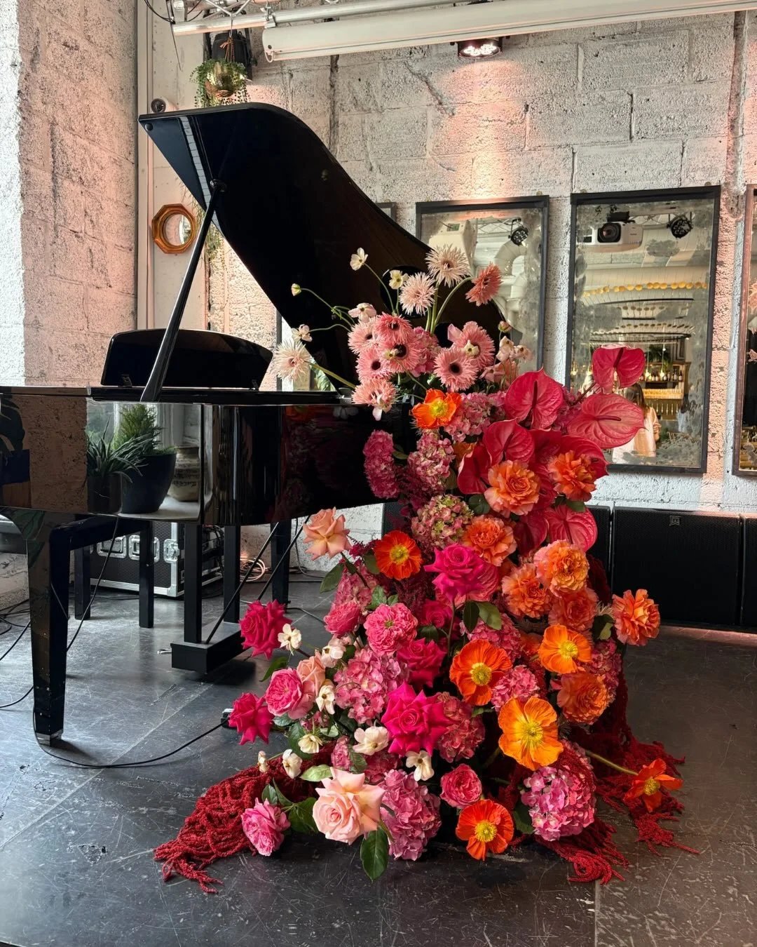 Jenna &amp; Owen&rsquo;s day at @londonkindred in London 💖🧡 we created a statement waterfall piano moment that set the tone for the entire celebration. 

Their vision was all about colour! Think vibrant pinks melting into warm orange tones, designe