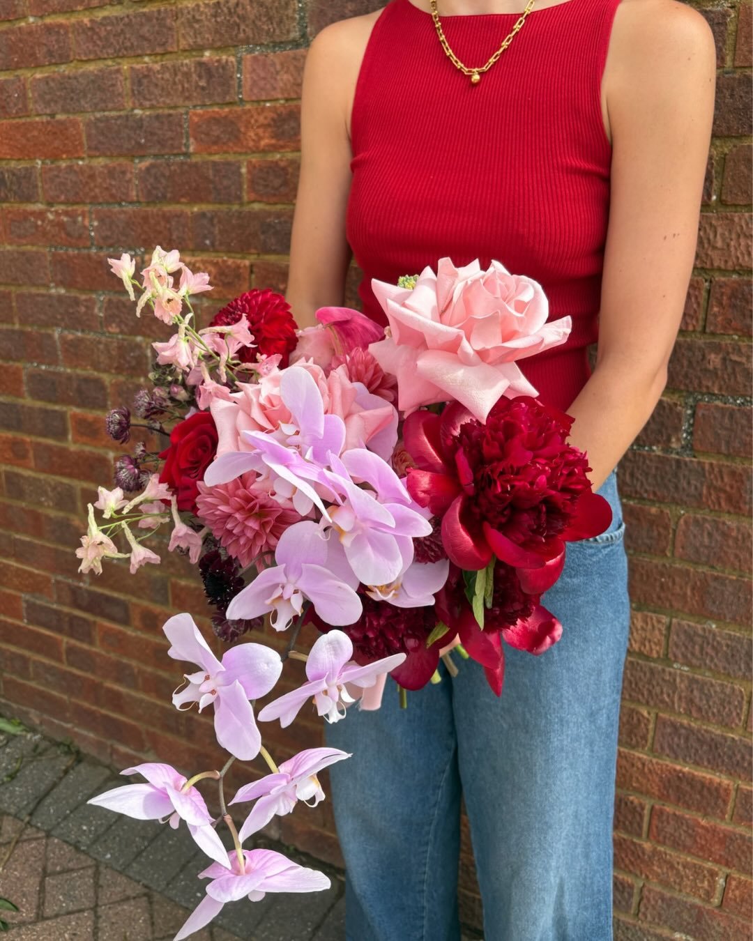 An archive of Lauren&rsquo;s frilly peony bouquet 💞 raspberry tones swirled with soft pinks and lilac hues, delicious enough to eat! 

#bridalbouquet #orchidbouquet #peony #peonybouquet #weddingflorist