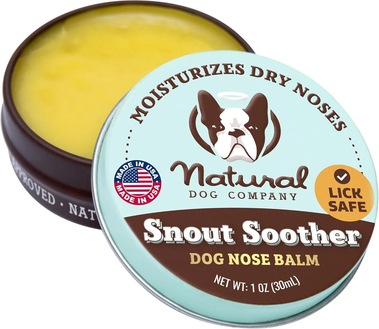 Dog nose balm container labeled Natural Dog Company Snout Soother, Moisturizes Dry Noses, Lick Safe, 1 ounce, net weight 30 milliliters, with dog face illustration and American made badge.