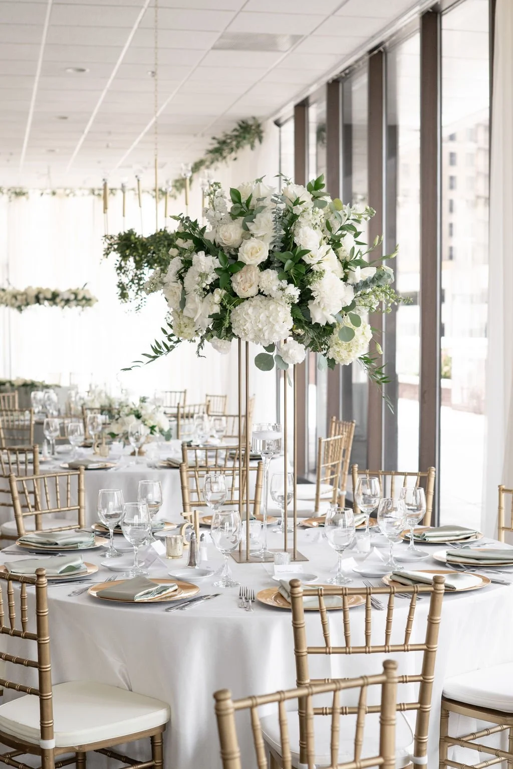 Tall ball centerpiece designed by K.I.S Florals for an Indianapolis wedding reception, adding height and impact to guest tables.