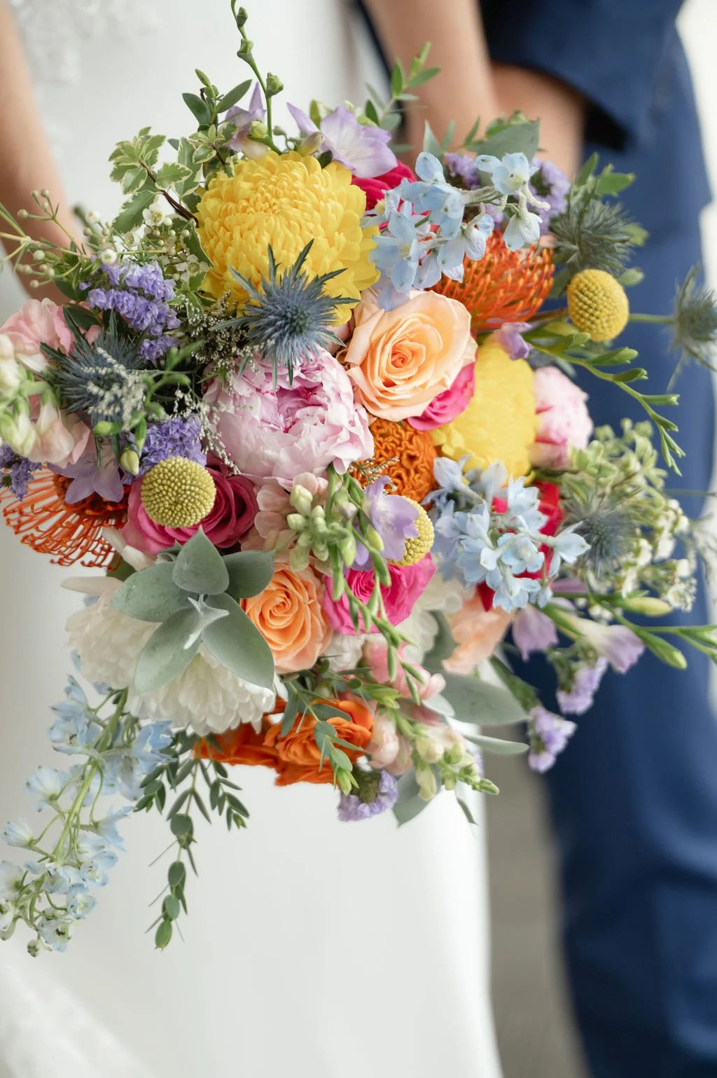 Custom bridal bouquet designed by K.I.S Florals in Indianapolis, showcasing a vibrant, whimsical wedding floral style.