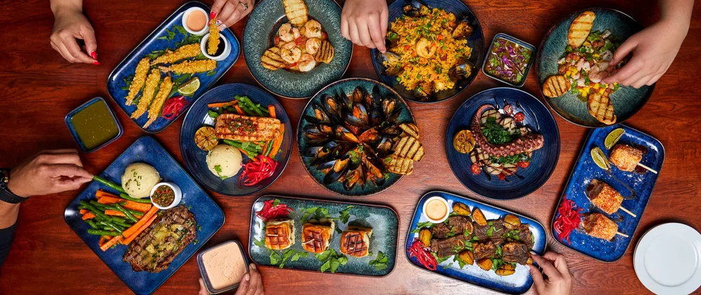 A spread of Colombian, Salvadoran and Mexican dishes at Bono East Boston