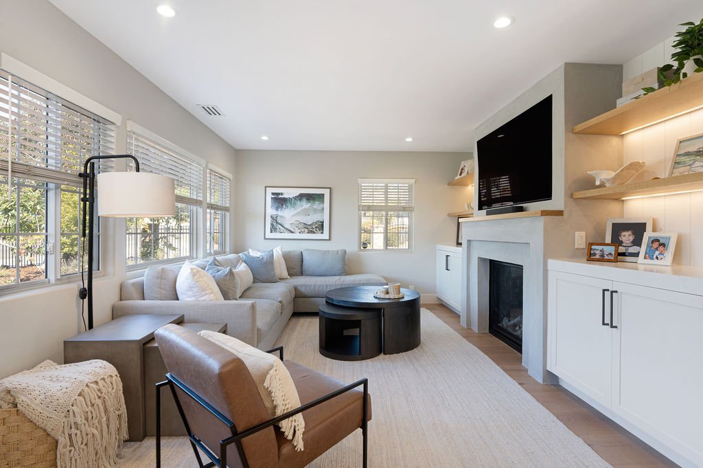 This space needed a serious rethink. 🧠✨

The layout of this living room felt choppy and disconnected&mdash;and the client wanted the fireplace in the living room, not off to the side where it originally was. 

So we reimagined the flow to make it mo