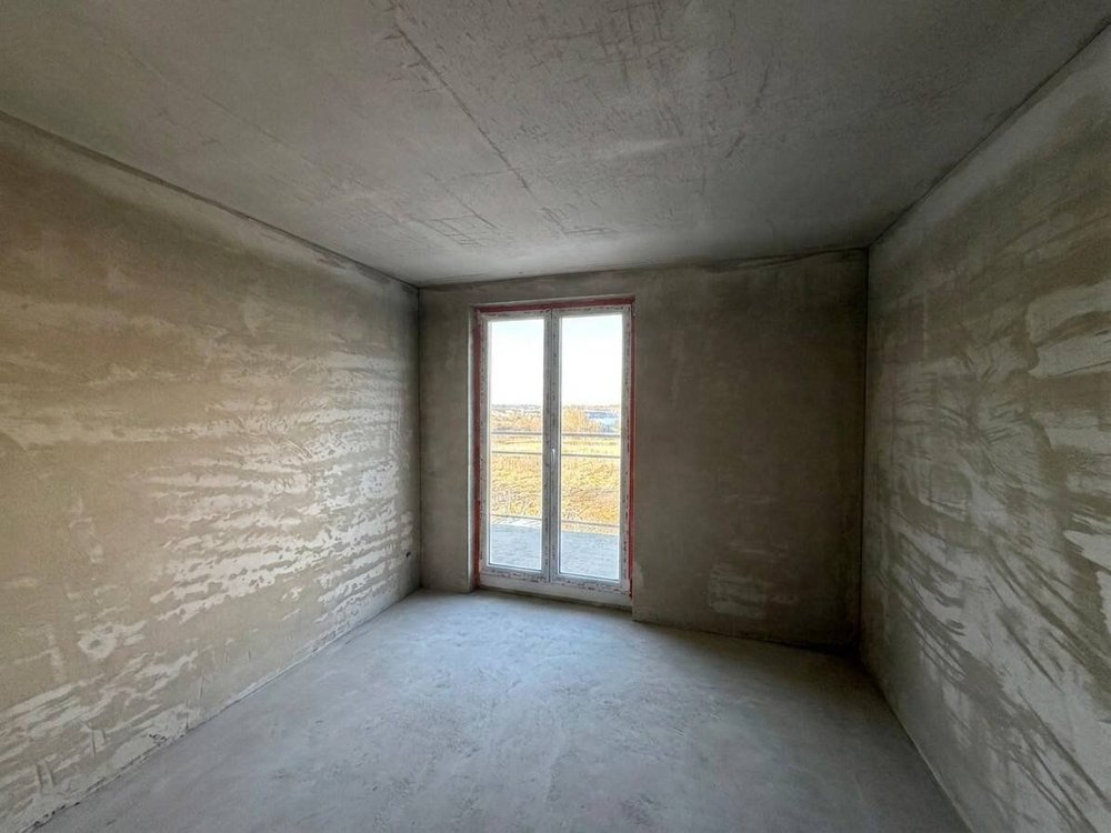 Zimmer mit gesetzter Balkontür und Weitblick ins Grüne, Talberg-Park Schaffhausen
