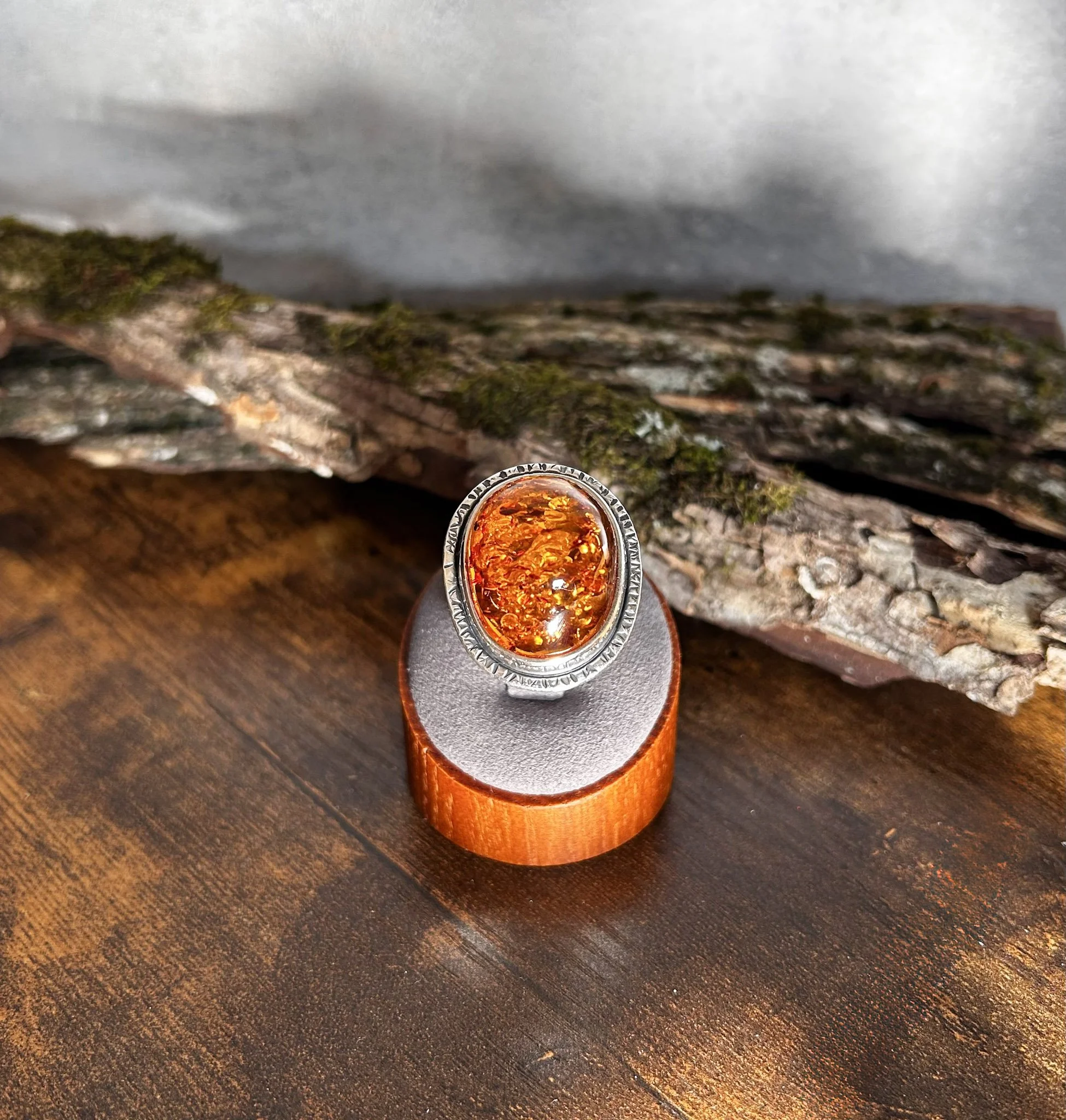 Oval cognac colored Baltic amber silver ring