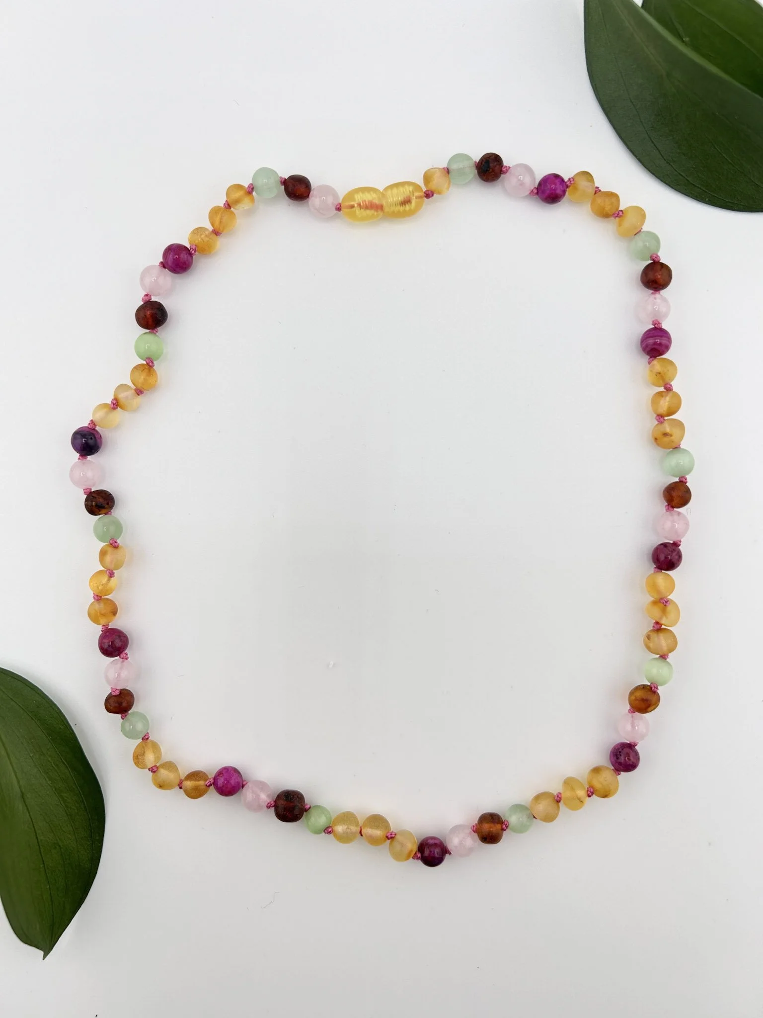 Baroque bead Baltic amber necklace with raw honey, rose agate, quartz, and pink cat eye
