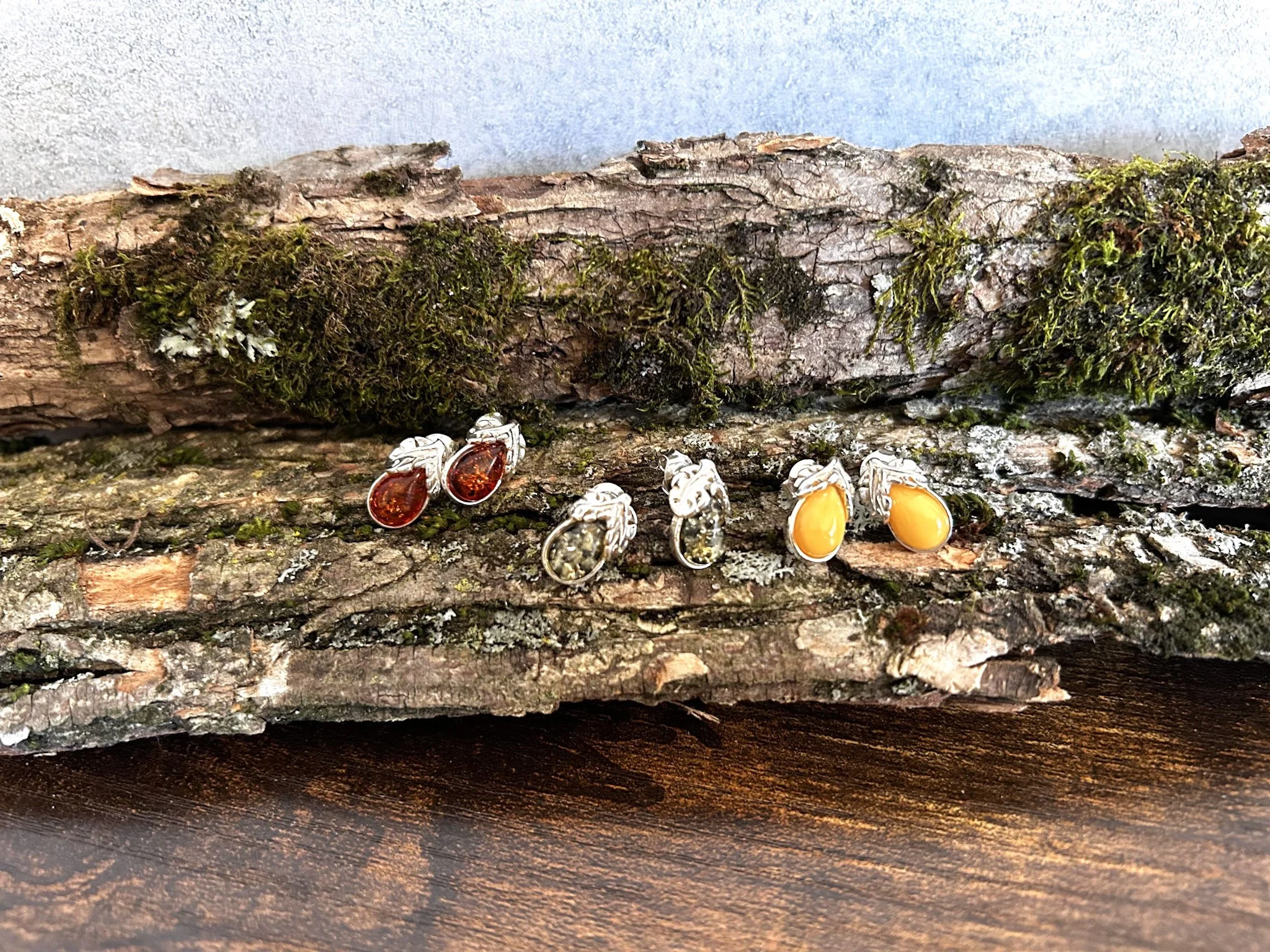Acorn shaped silver stud earrings with amber