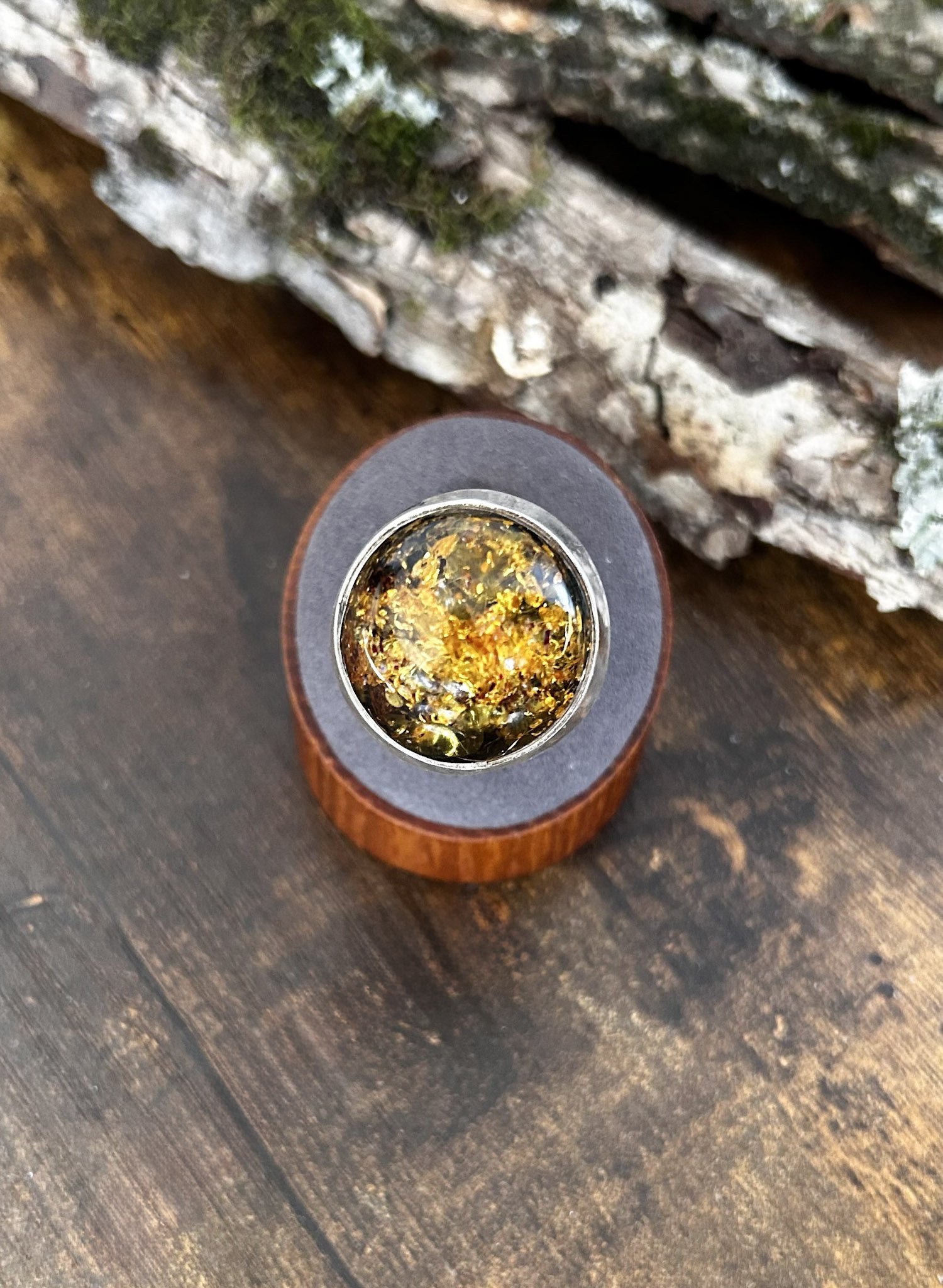 Round shaped cognac Baltic amber silver ring