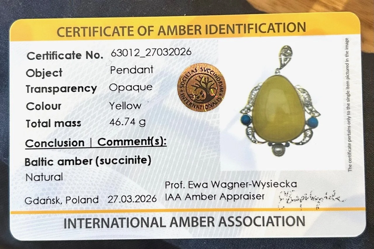an image of the certificate for the amber pendant