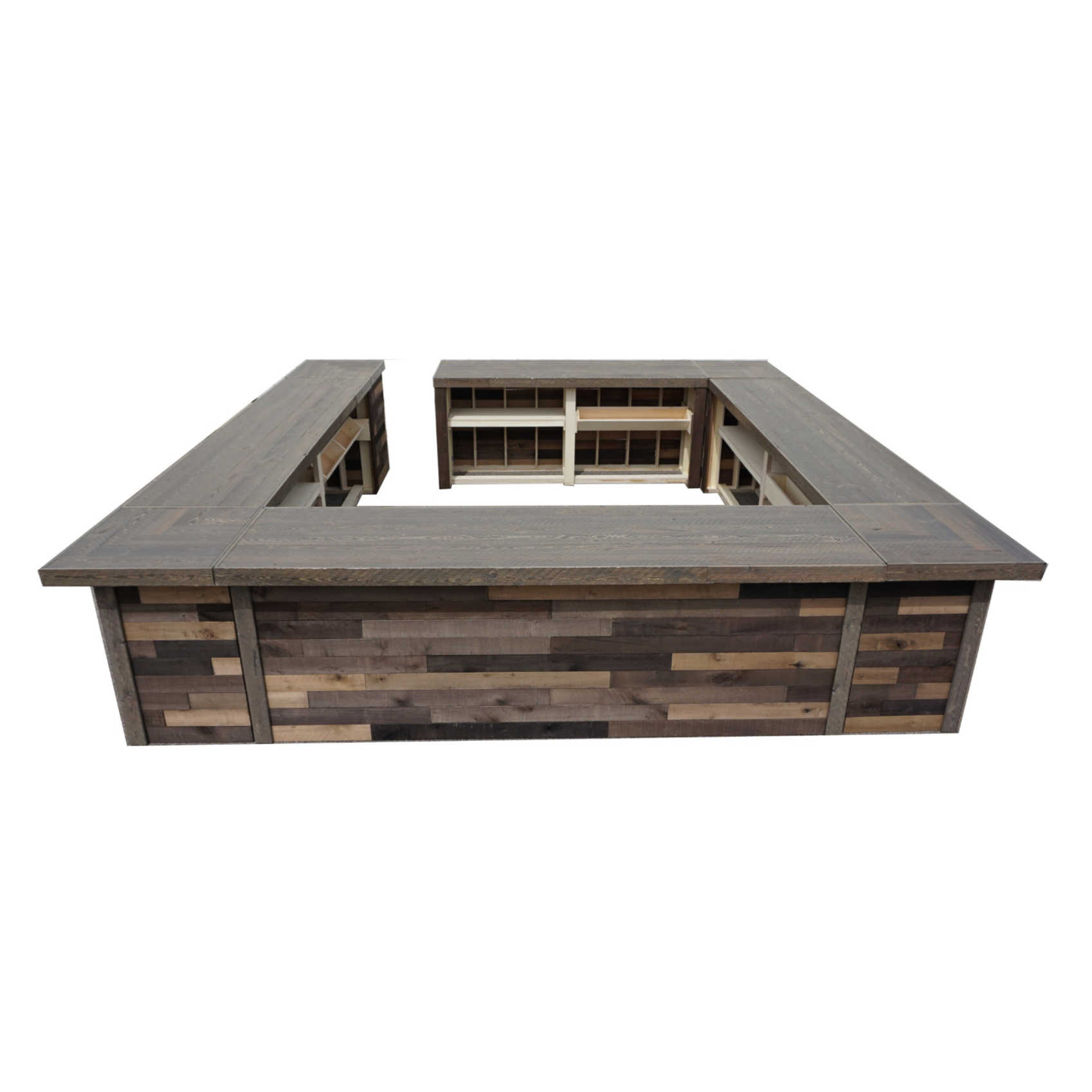 Photo of a U-shaped wooden bar or counter with open shelves underneath, set against a plain white background.