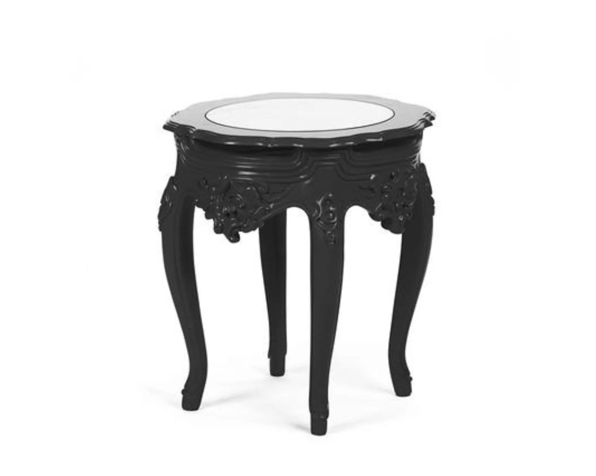 Black ornate wooden side table with intricate carvings, featuring a round white top, against a plain white background.