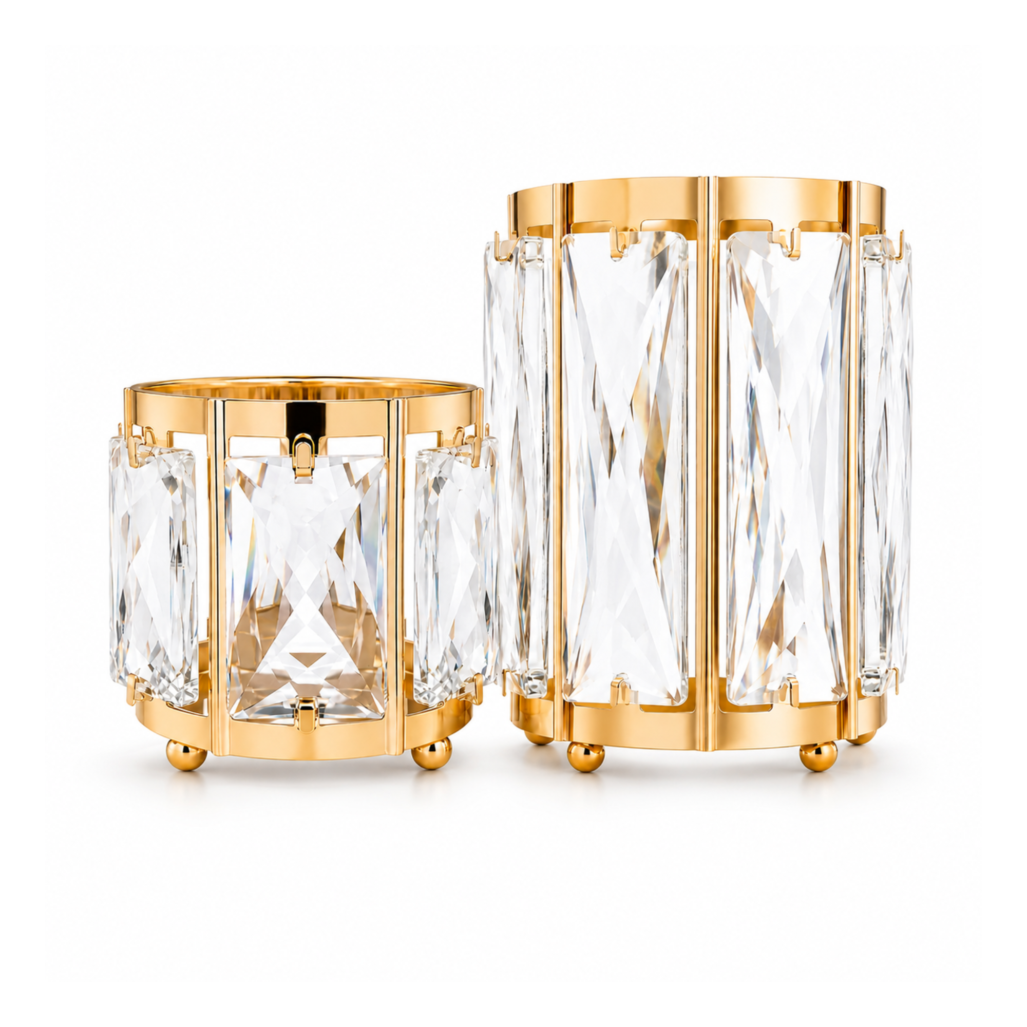 A pair of jewelry displayed on gold and crystal stands, with the stands having a metallic gold finish and faceted clear crystal sections.