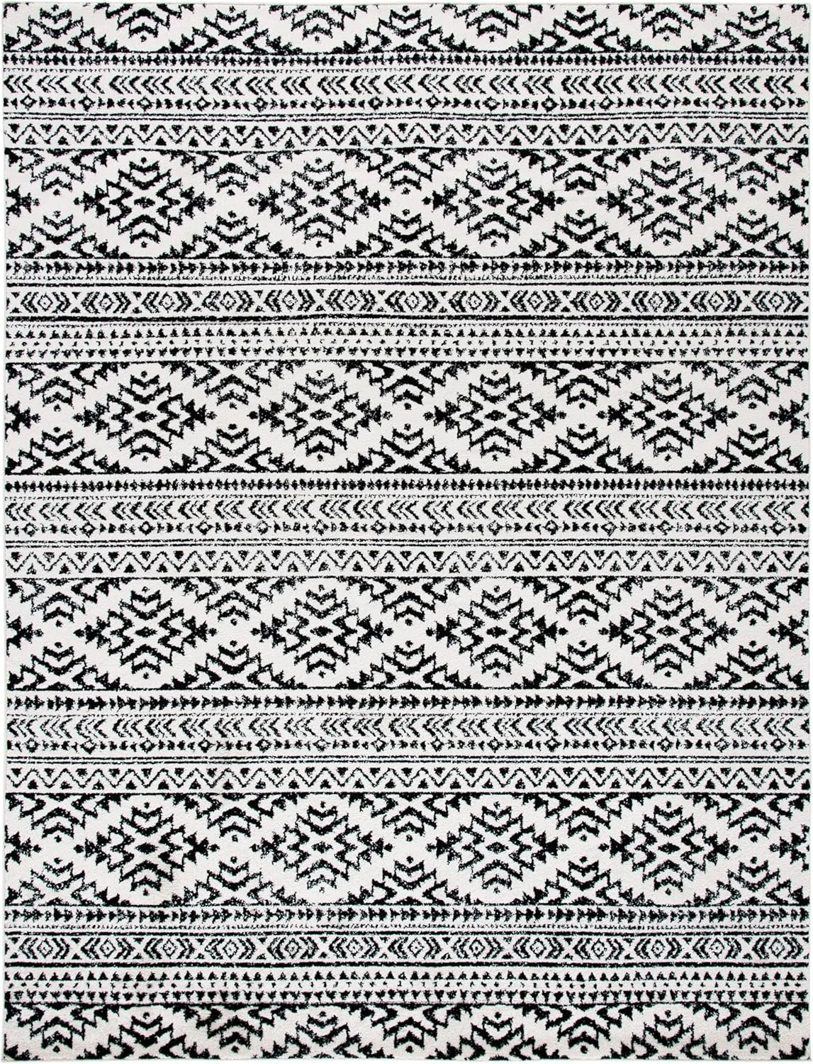 Black and white geometric tribal pattern with diamond and chevron shapes arranged in horizontal rows.