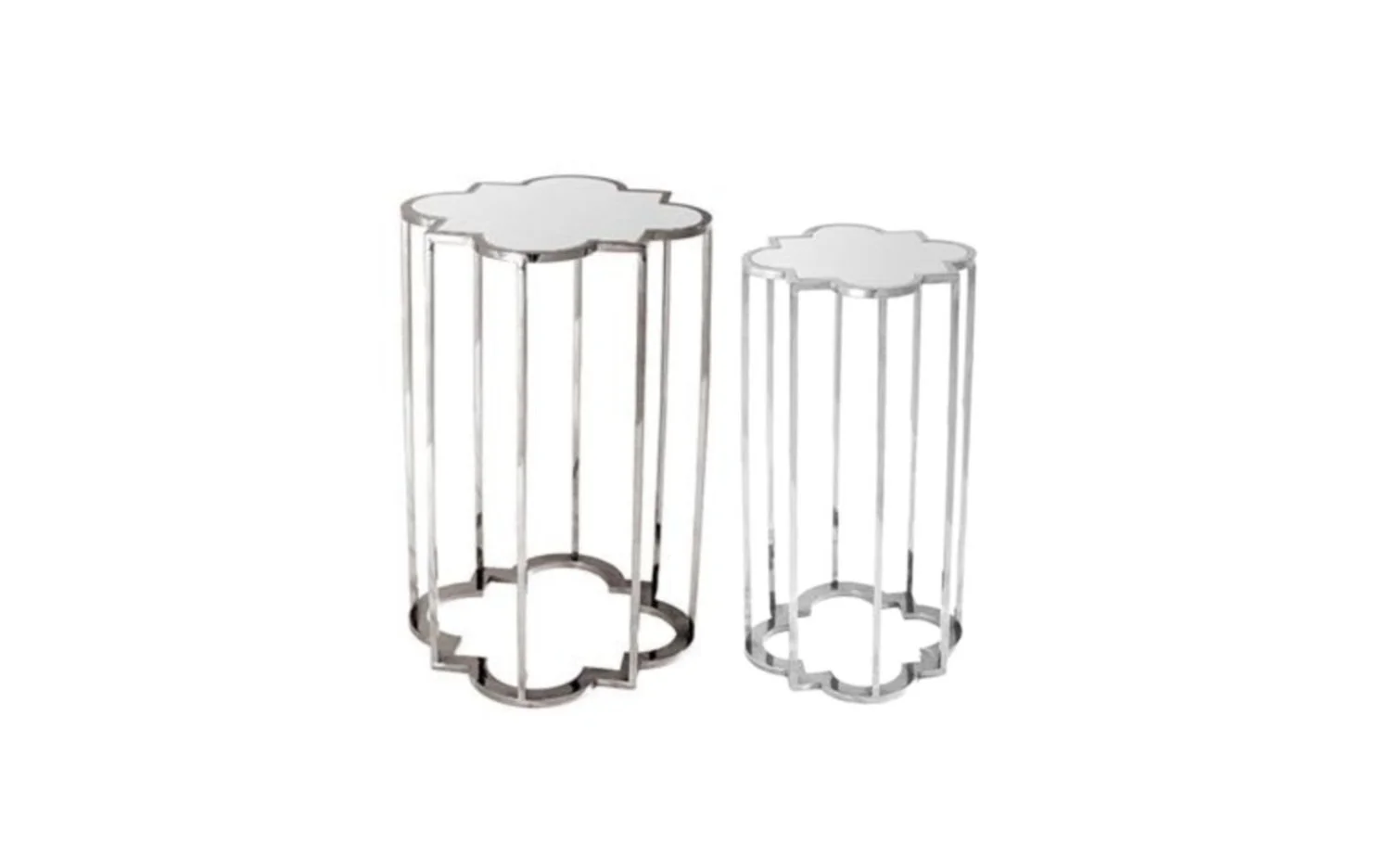 Two modern cylindrical side tables with reflective silver tops and geometric floral bases.