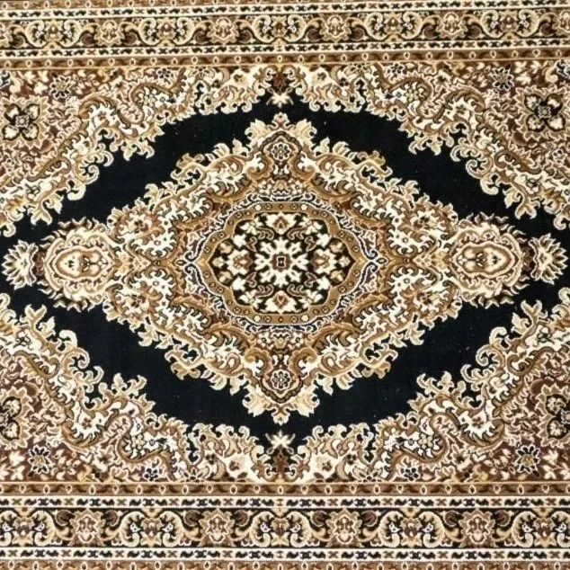 Close-up of a traditional patterned Persian-style rug with intricate floral and geometric designs in beige, black, and brown colors.