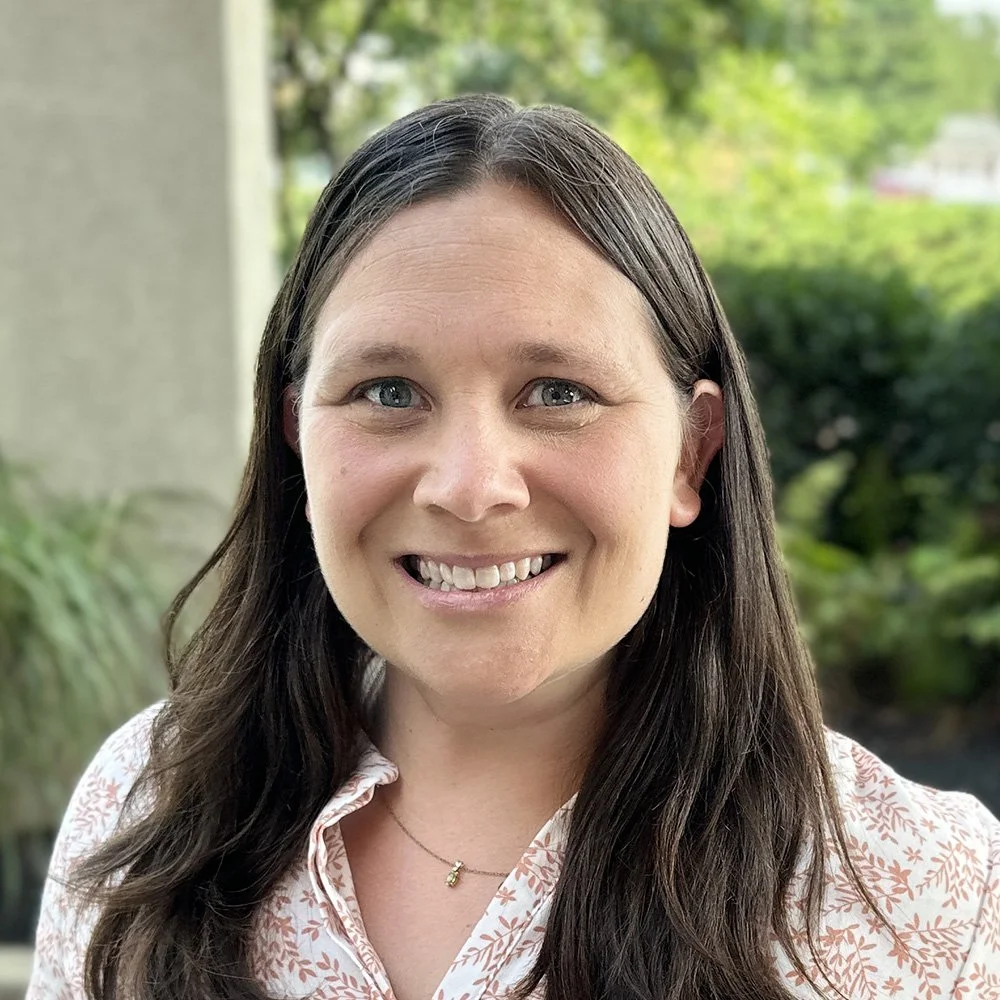 Amber Fidler, LCCS Admissions Coordinator, smiling outdoors