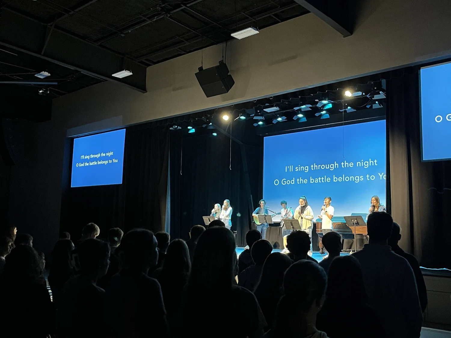 Students leading worship in chapel