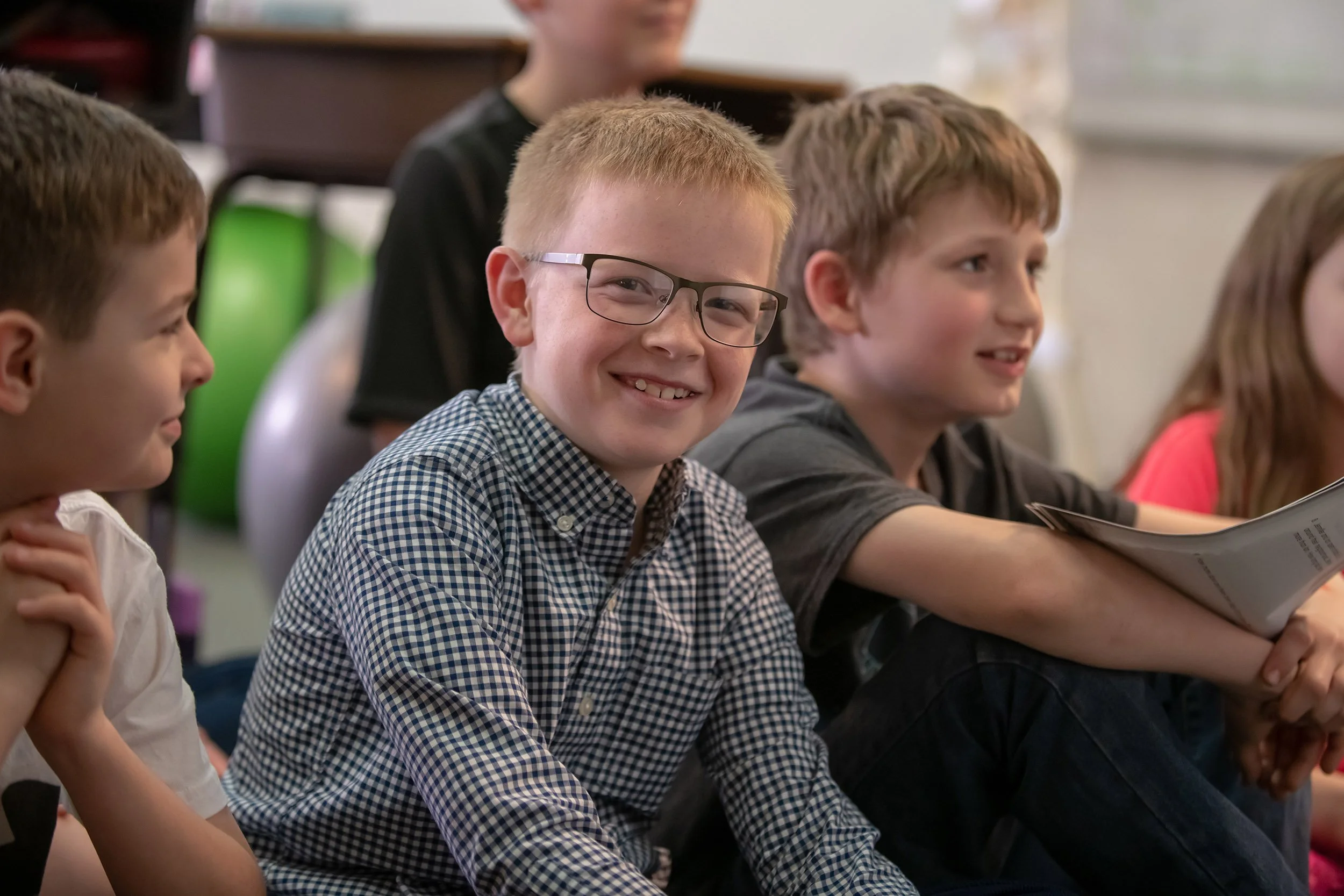 LCCS students smiling in class