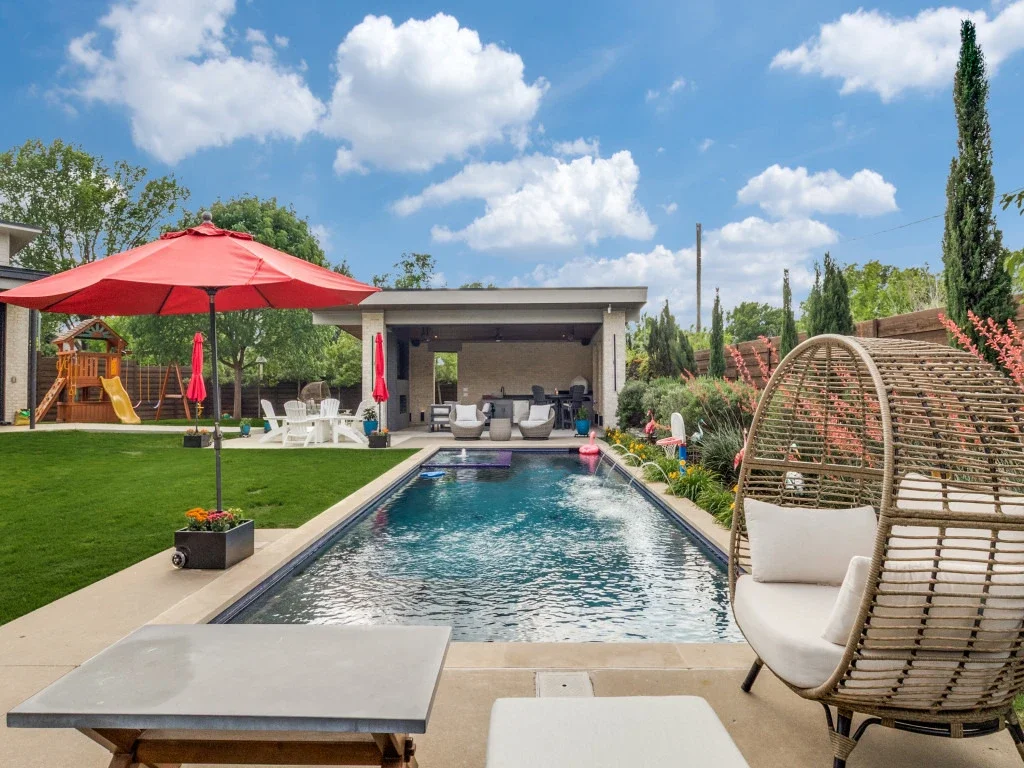 A freestanding patio cover with plenty of seating areas.