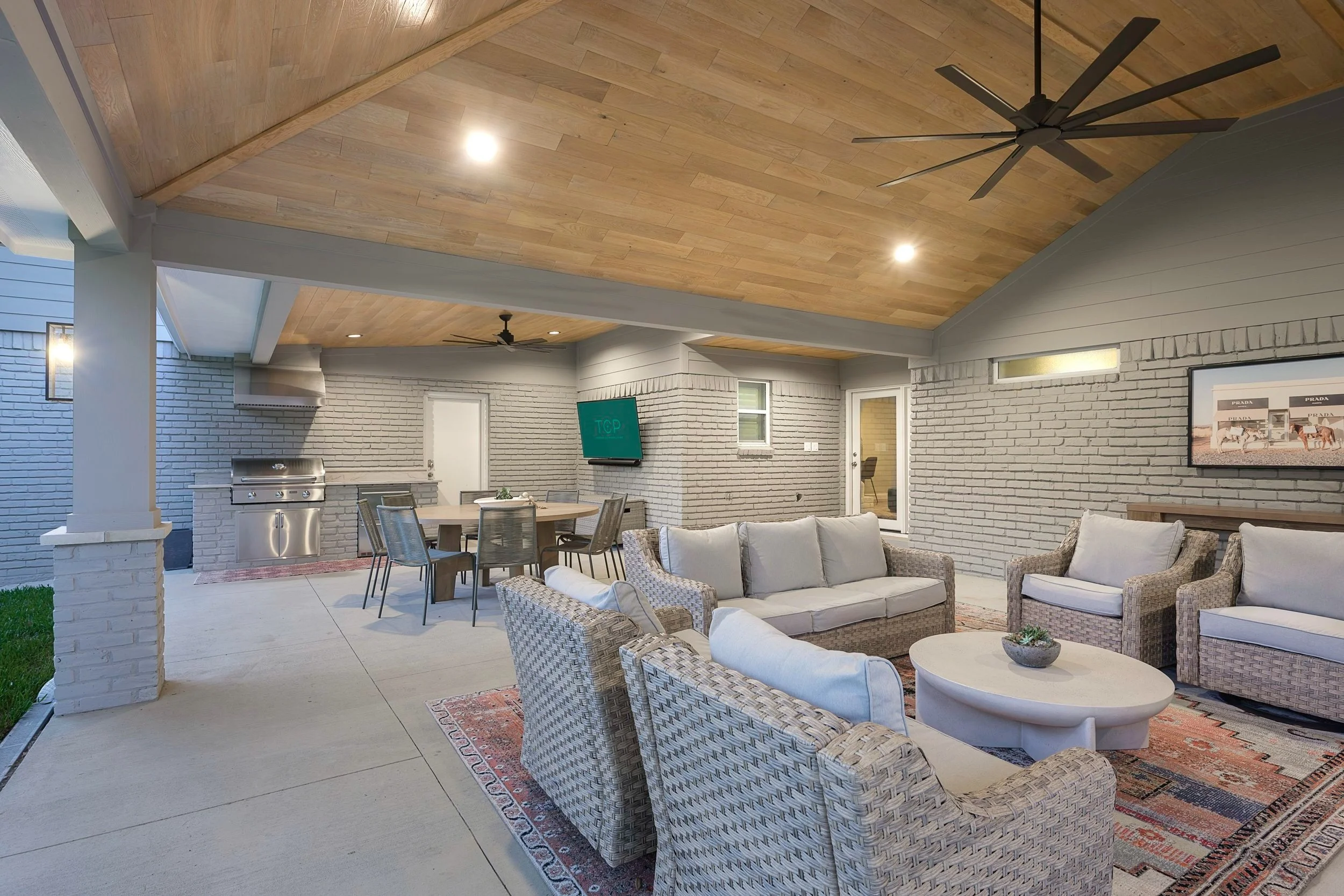 Custom Patio Cover with Outdoor Kitchen and Fireplace in Dallas by TCP