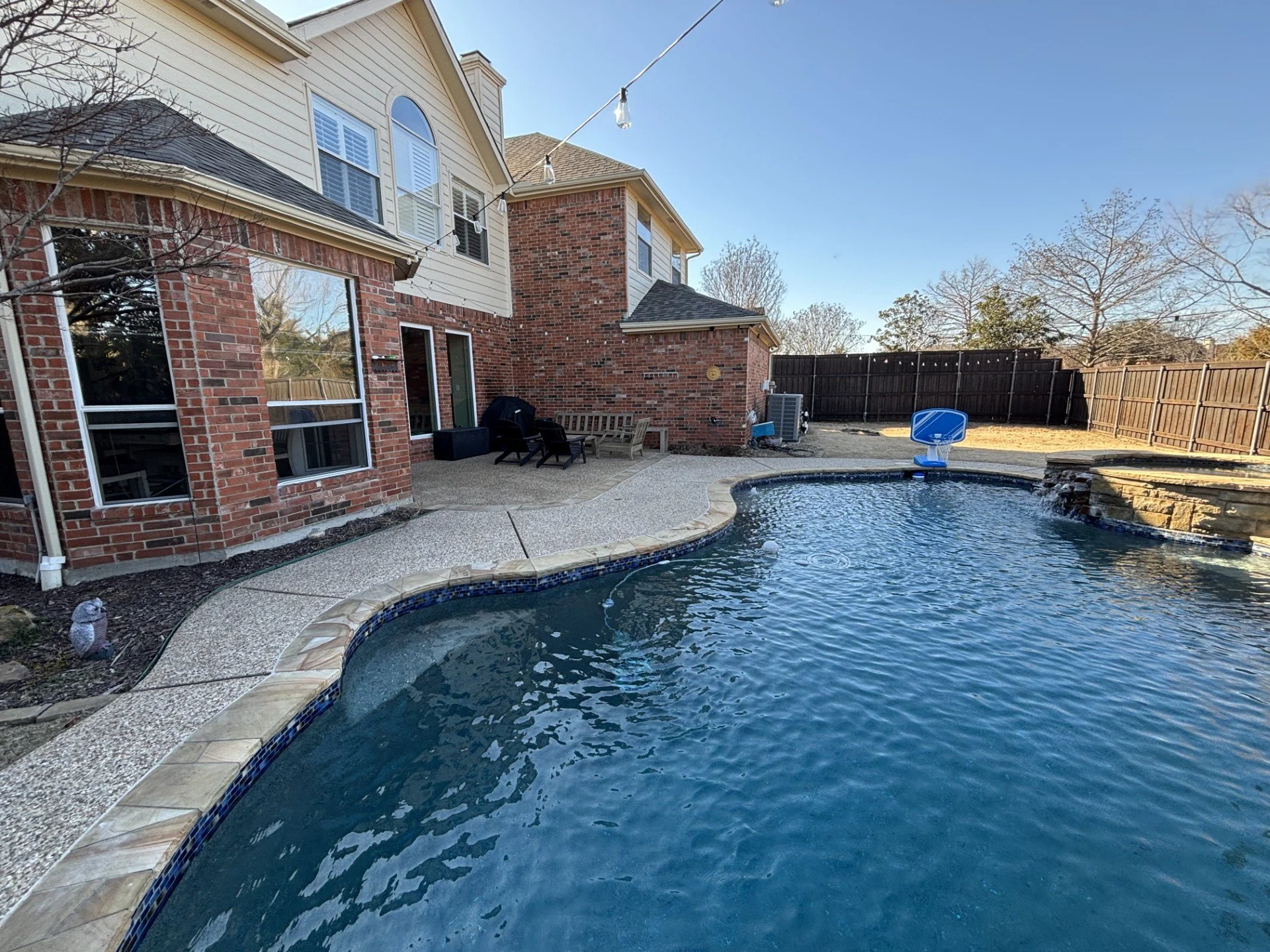 A Before Photo of a Patio Cover and Outdoor Kitchen Project in Allen