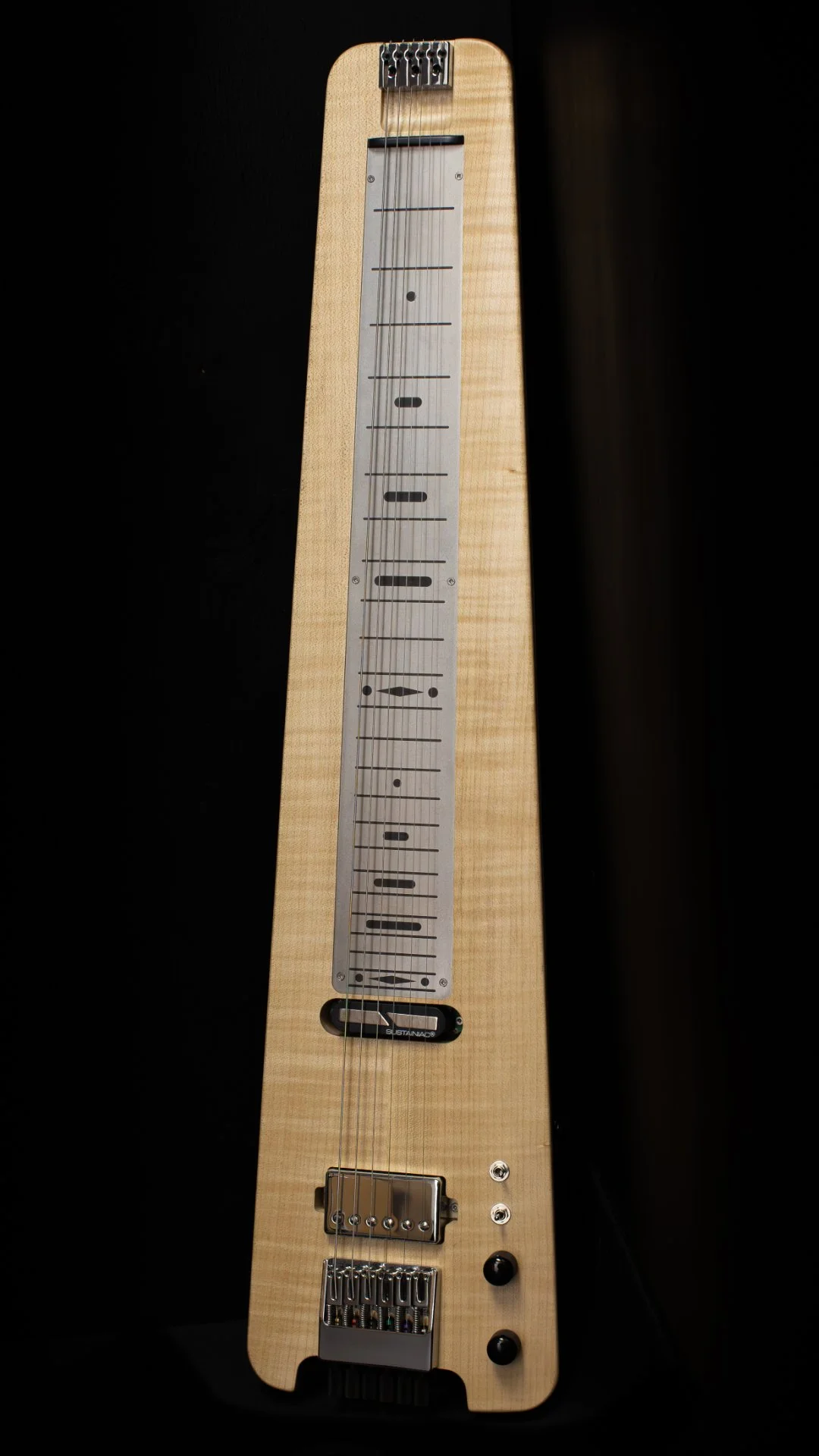 A modern headless lapsteel with a flame maple cap, chrome hardware and Sustainiac pickup
