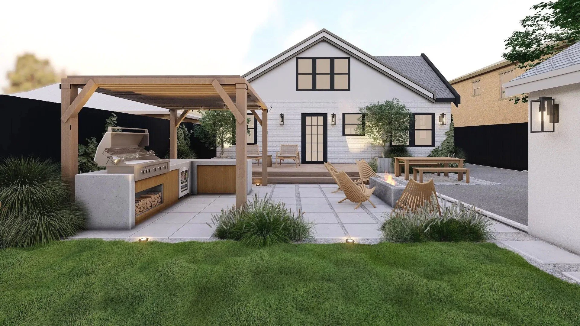 Backyard with patio, outdoor kitchen, fire pit, seating, and landscaped garden in front of a modern white house with black window frames.