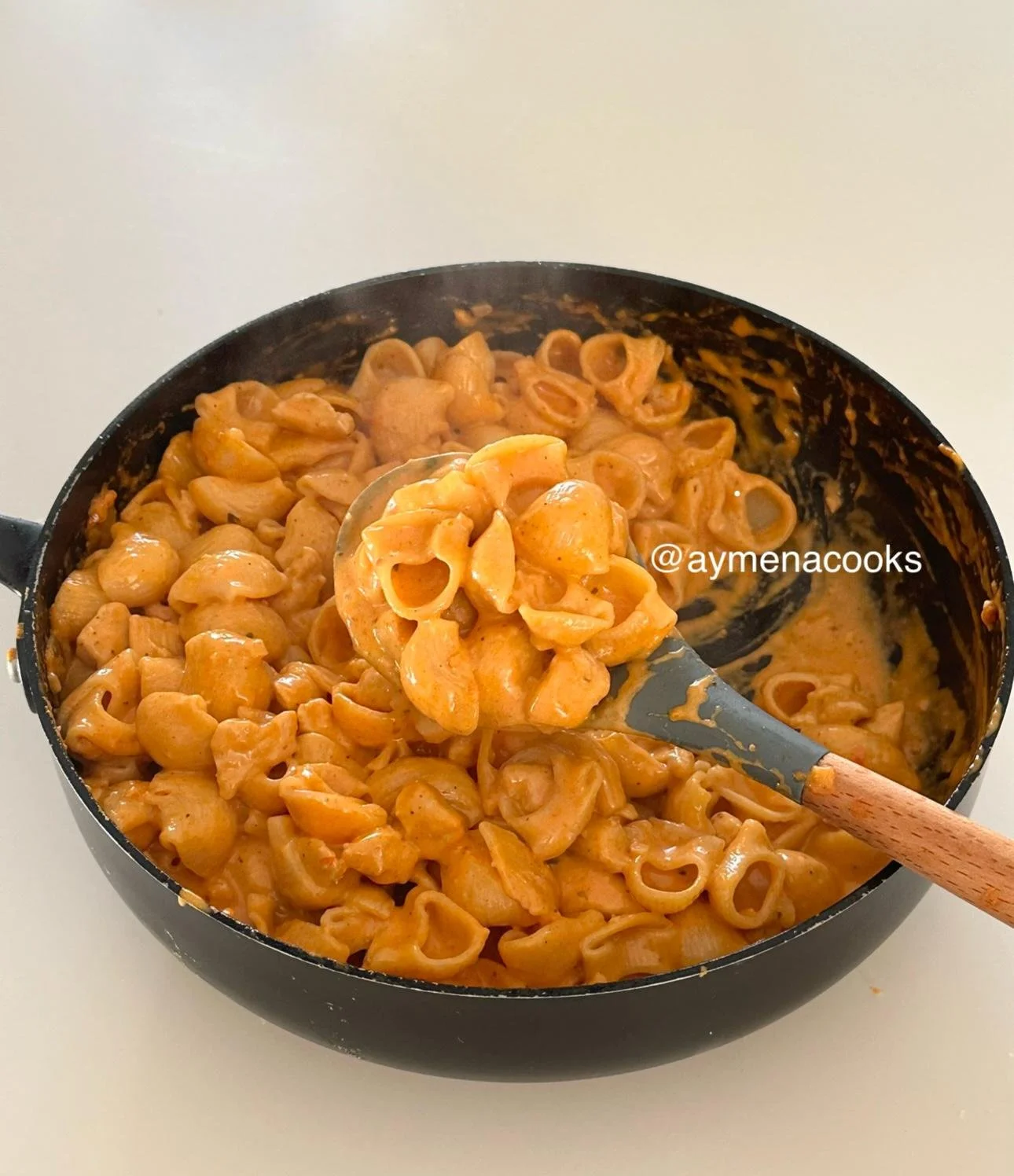 add cooked pasta and coat in sauce.jpeg