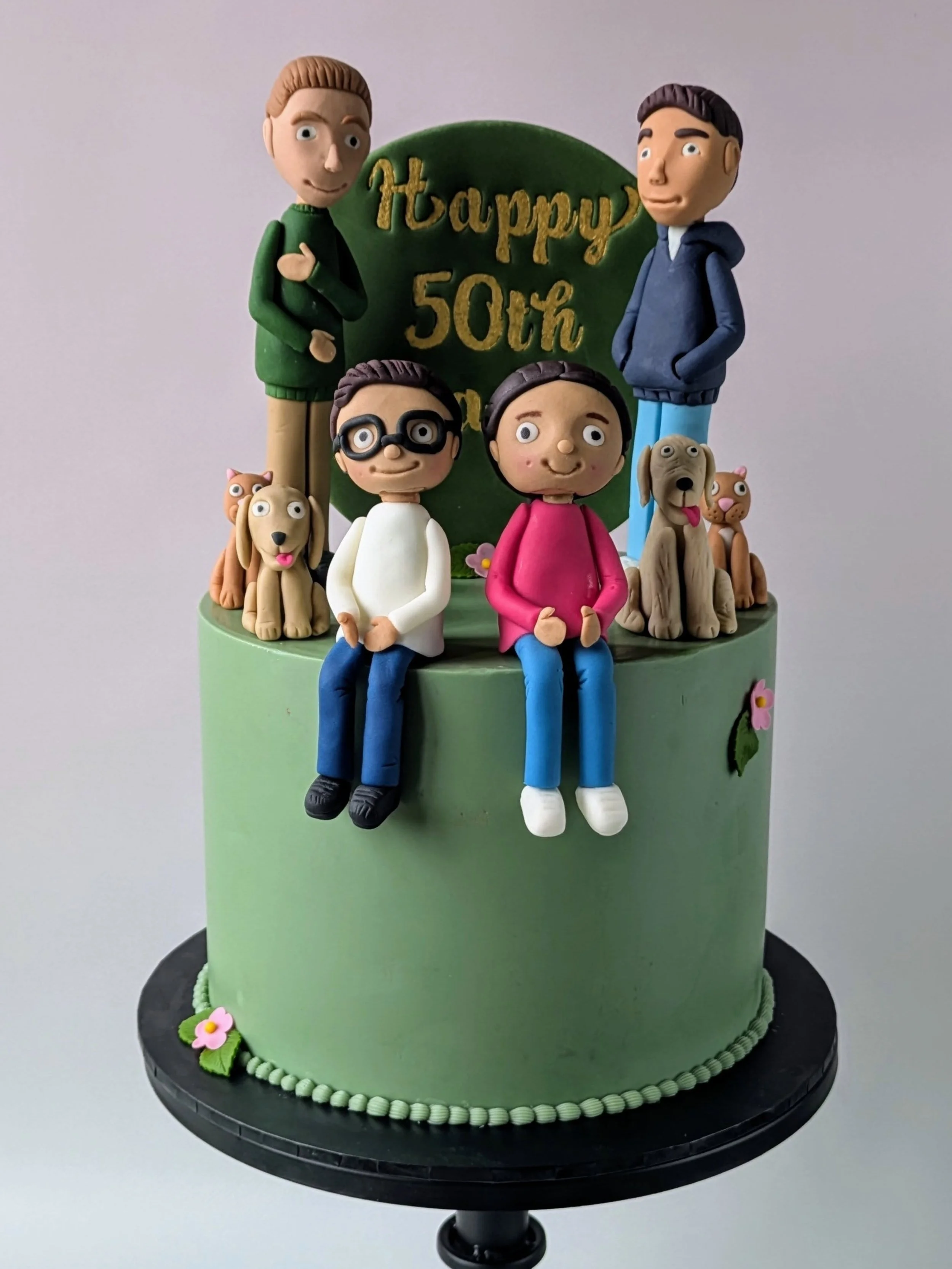 This isn't just a cake. It's a portrait!

This came from one of the loveliest full circle moments. Arwel was actually at the very first event I ever made a cake for. He tried it, loved it, and a year later got in touch about his partner's 50th.

The 